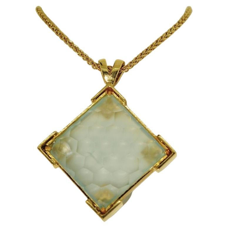 Carved in Idar Oberstein Germany by a master carver, this piece of Aquamarine with a 