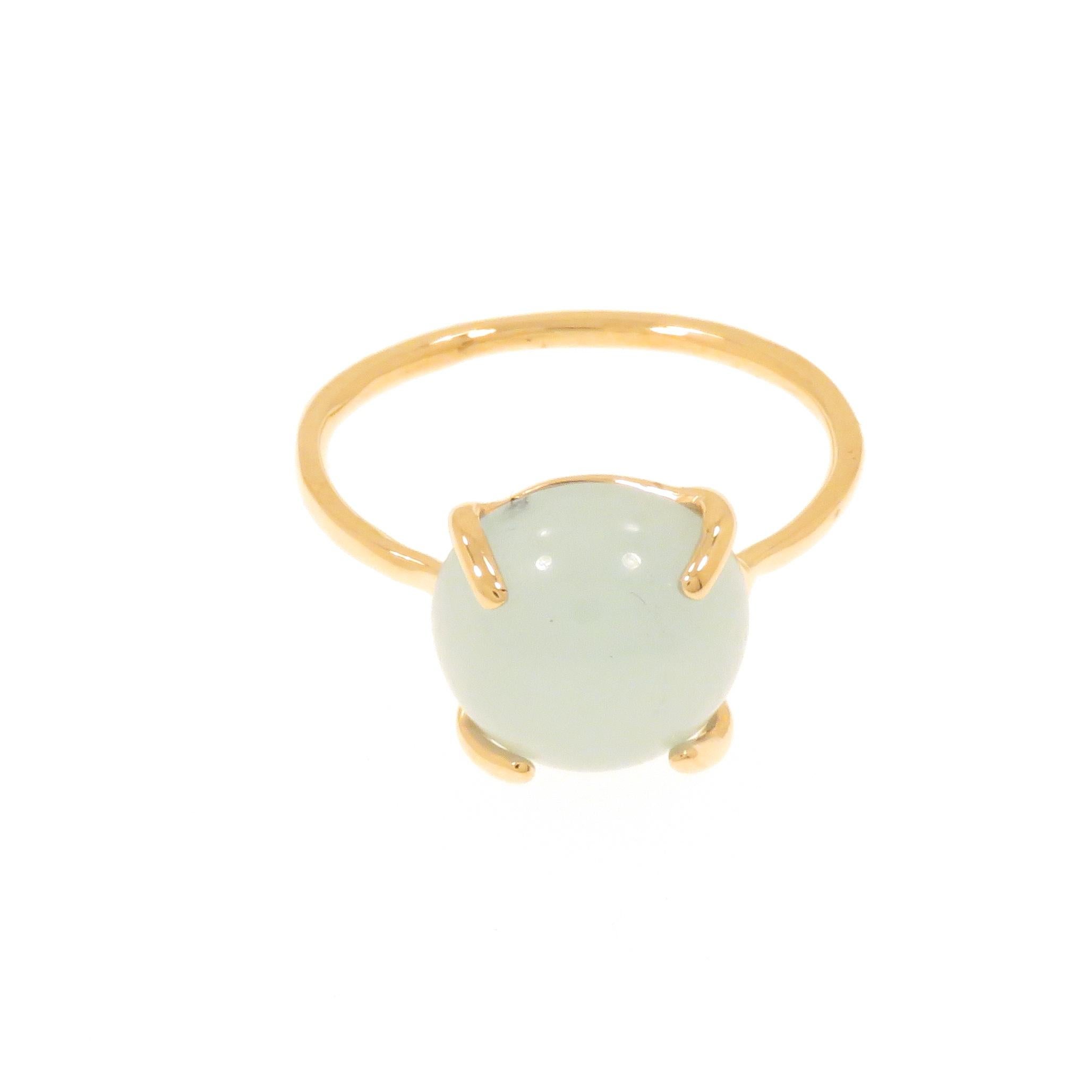 Cabochon cut aquamarine featured in a contemporary ring crafted in 9 karat rose gold. The size of the gemstone is 10x10 mm / 0.393x0.393 inches. US finger size is 6 , French size 52, Italian size 12, resizable to the customer's size before shipment.