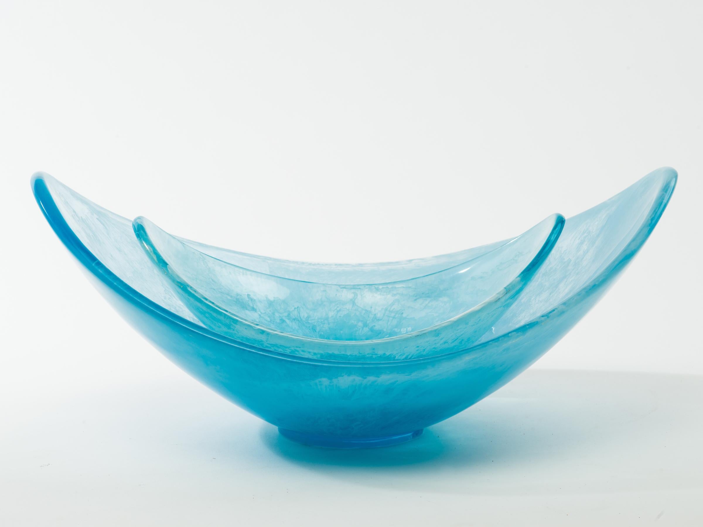 Set of graceful aquamarine acrylic scoop serving bowls. Large bowl measures 20.5 inches length x 13.5 inches depth x 9 inches height. Smaller bowl measures 13.5 inches length x 9 inches depth x 6 inches height.