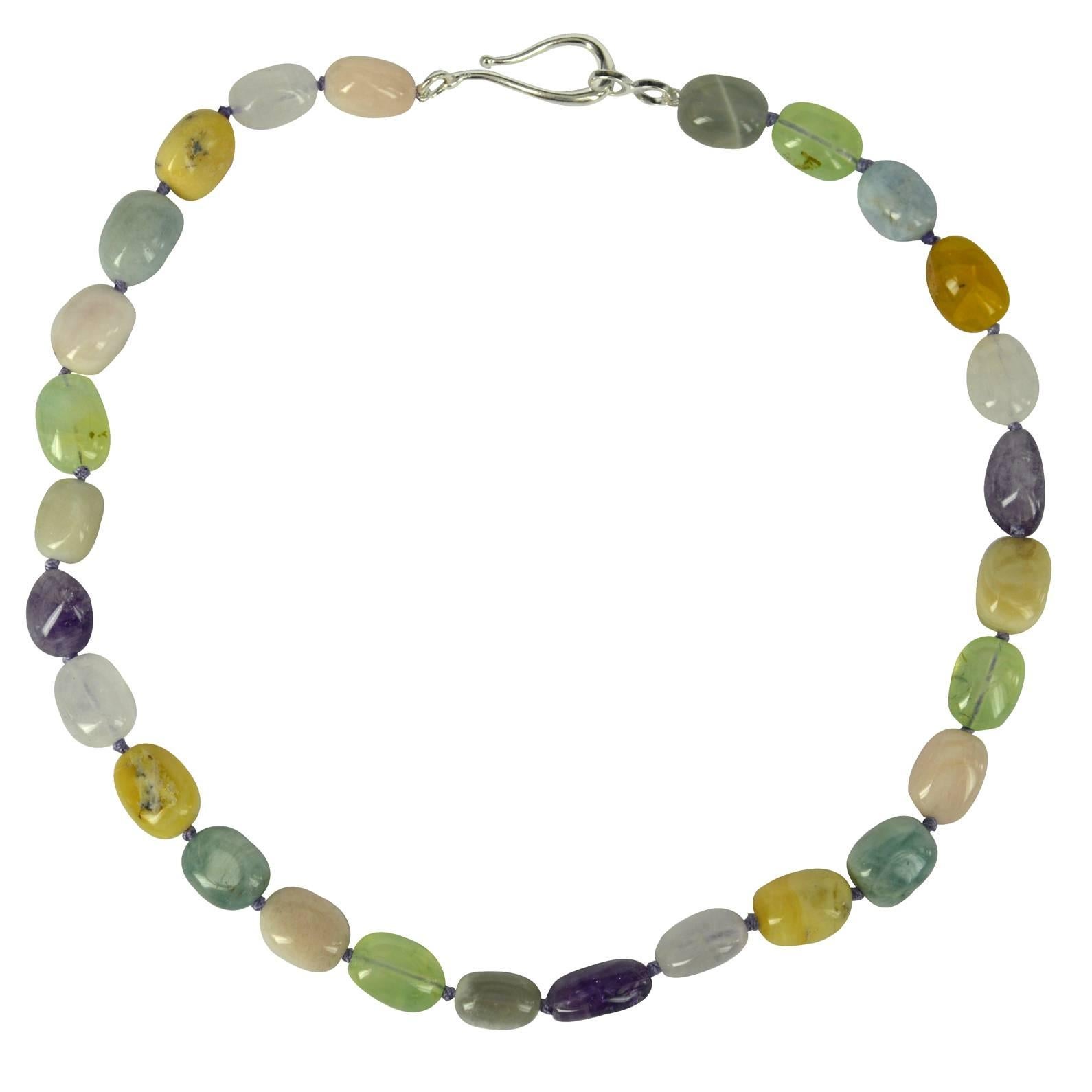 Aquamarine, Amethyst, Prehnite, Opal, Morganite, Rose Quartz natural Polished Nuggets approx 15x12mm with a 40mm Sterling Silver hook Clasp, hand knotted for strength and durability.

Finished necklace measures 48cm.

Custom modification available