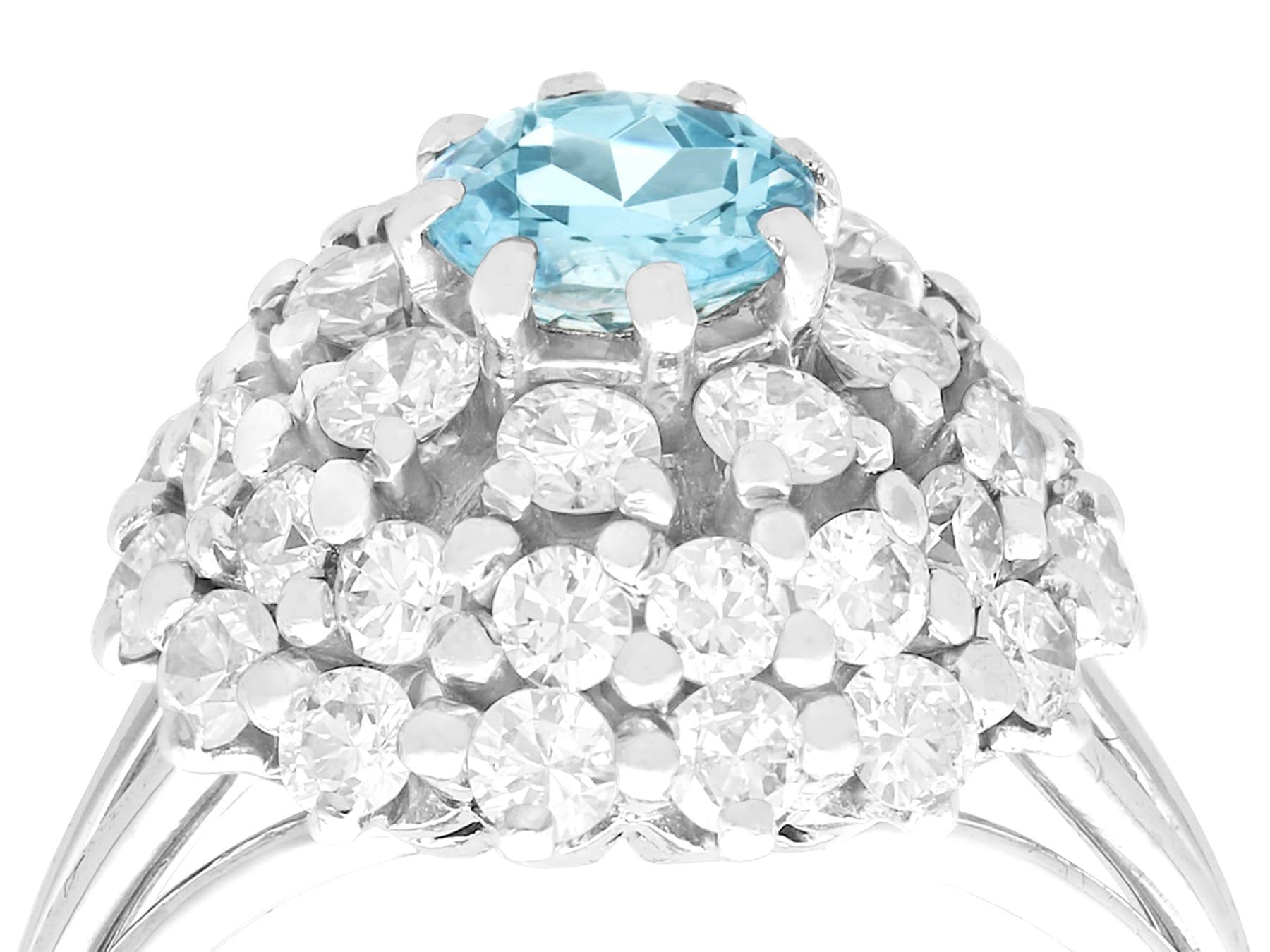 A stunning, fine and impressive vintage 0.63 carat aquamarine and 2.39 carat diamond, 18 karat white gold dress ring; part of our diverse vintage jewelry and estate jewelry collections.

This stunning, fine and impressive vintage aquamarine ring has
