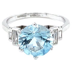 Aquamarine and baguette diamond trilogy cocktail ring platinum