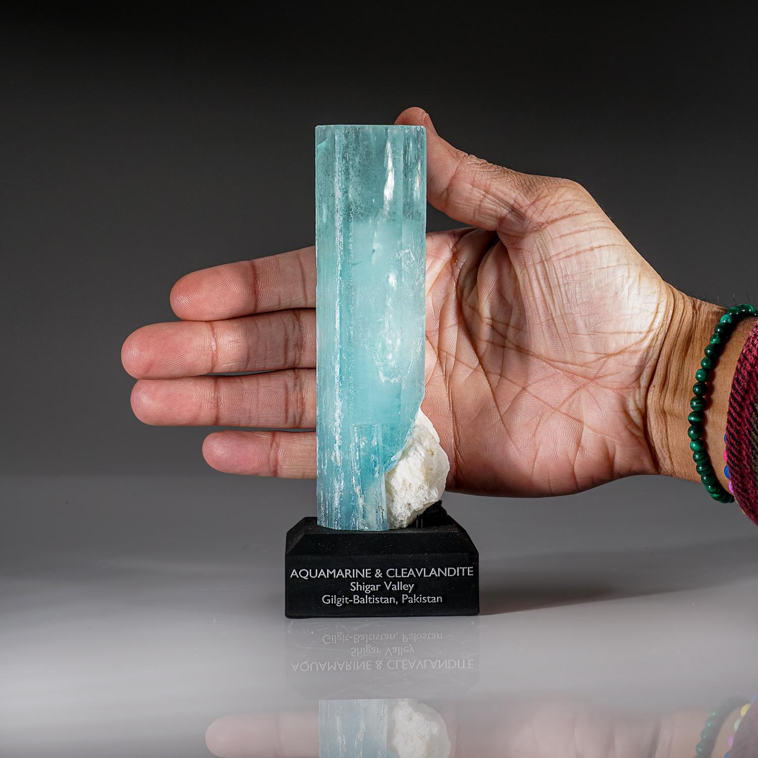 From Shigar Valley, Shigar District, Gilgit-Baltistan, Pakistan

Lustrous translucent to transparent gemmy crystals of aquamarine beryl with Cleavlandite. The aquamarine crystal is highly transparent with glassy crystal faces. Internally areas of