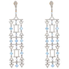 Boucles d'oreilles lustre en or 18 carats et argent avec aigue-marine et diamants