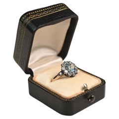 Aquamarine and Diamond Cluster Ring. 0.90 Round Cut Silver on 18K Yellow Gold