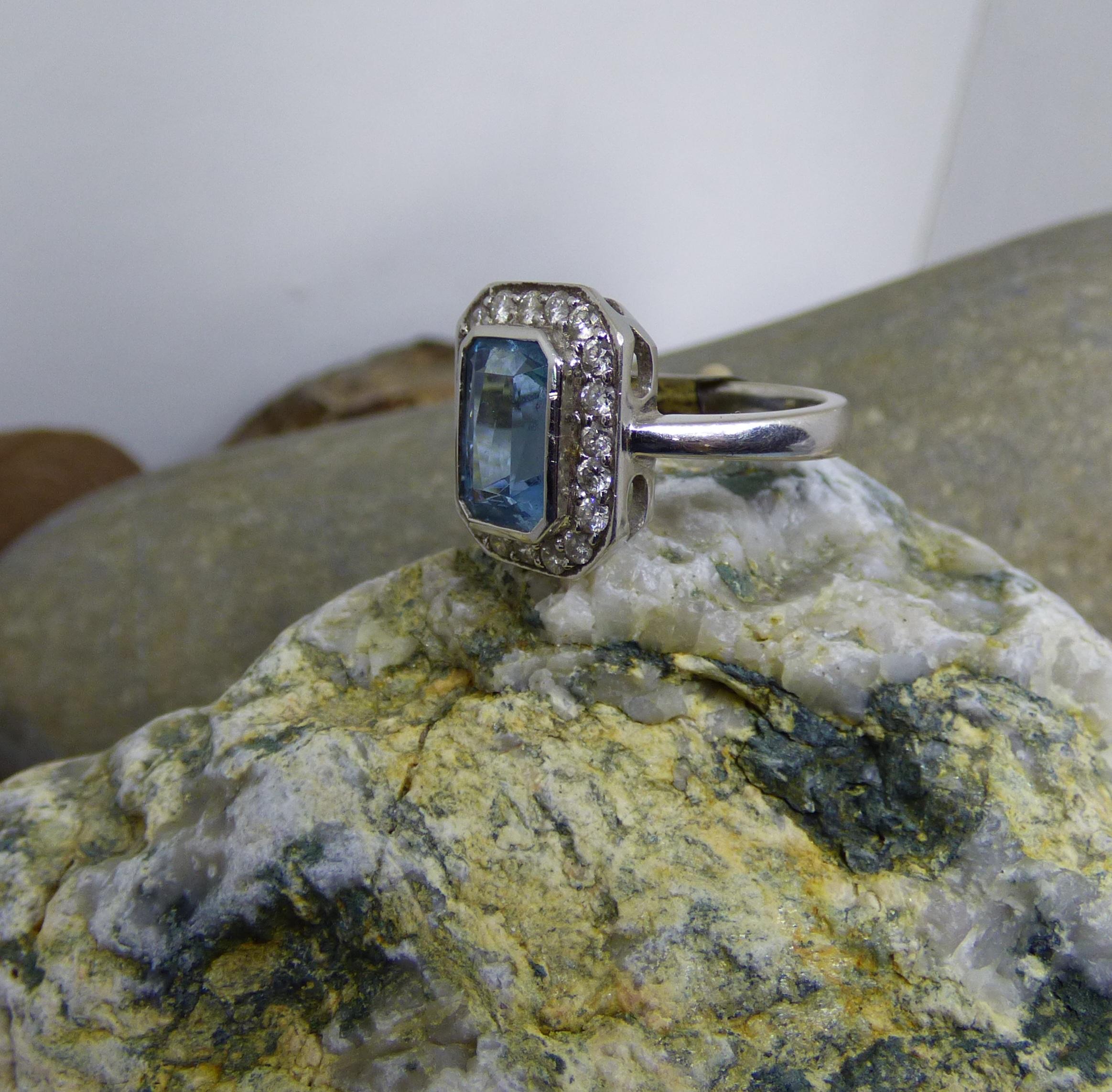 Emerald Cut Aquamarine and Diamond Cluster Ring For Sale