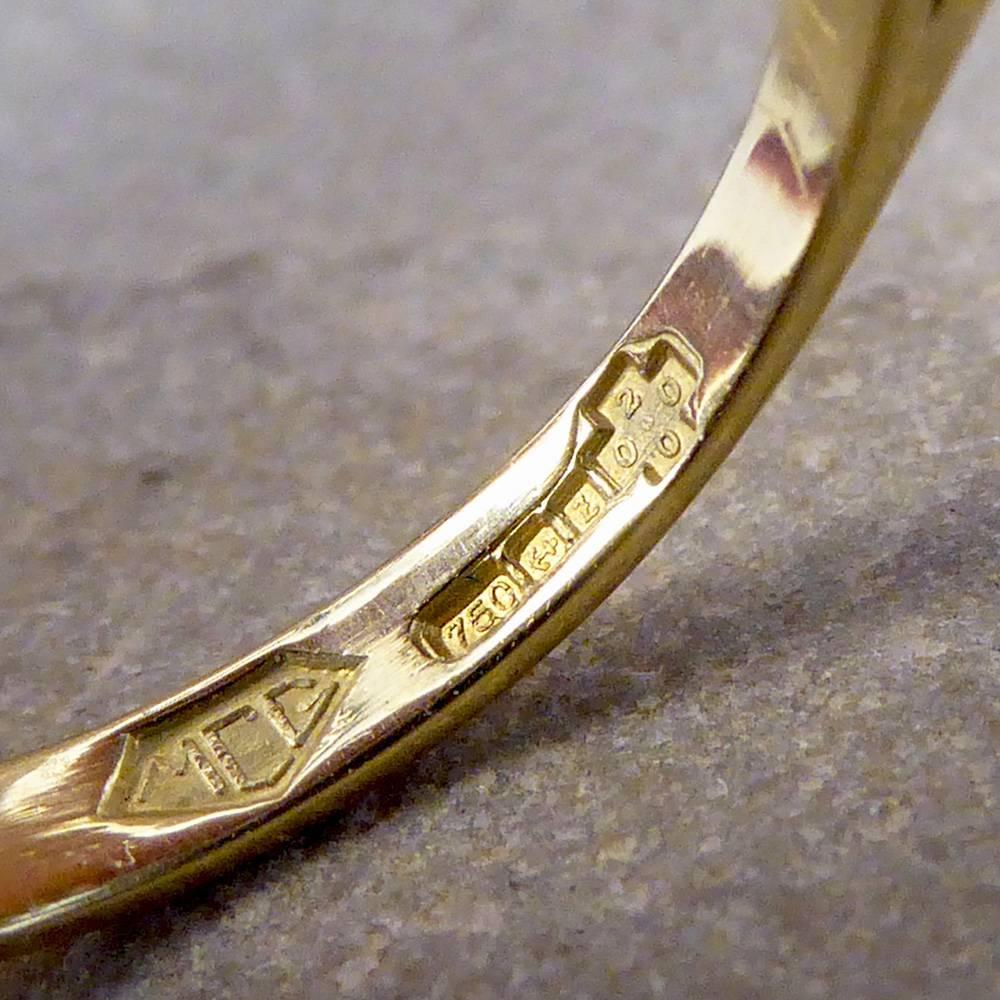Modern Aquamarine and Diamond Cluster Ring in 18 Carat Gold