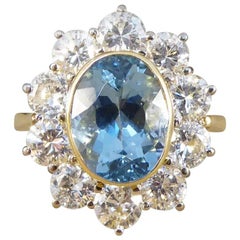 Aquamarine and Diamond Cluster Ring in 18 Carat Gold