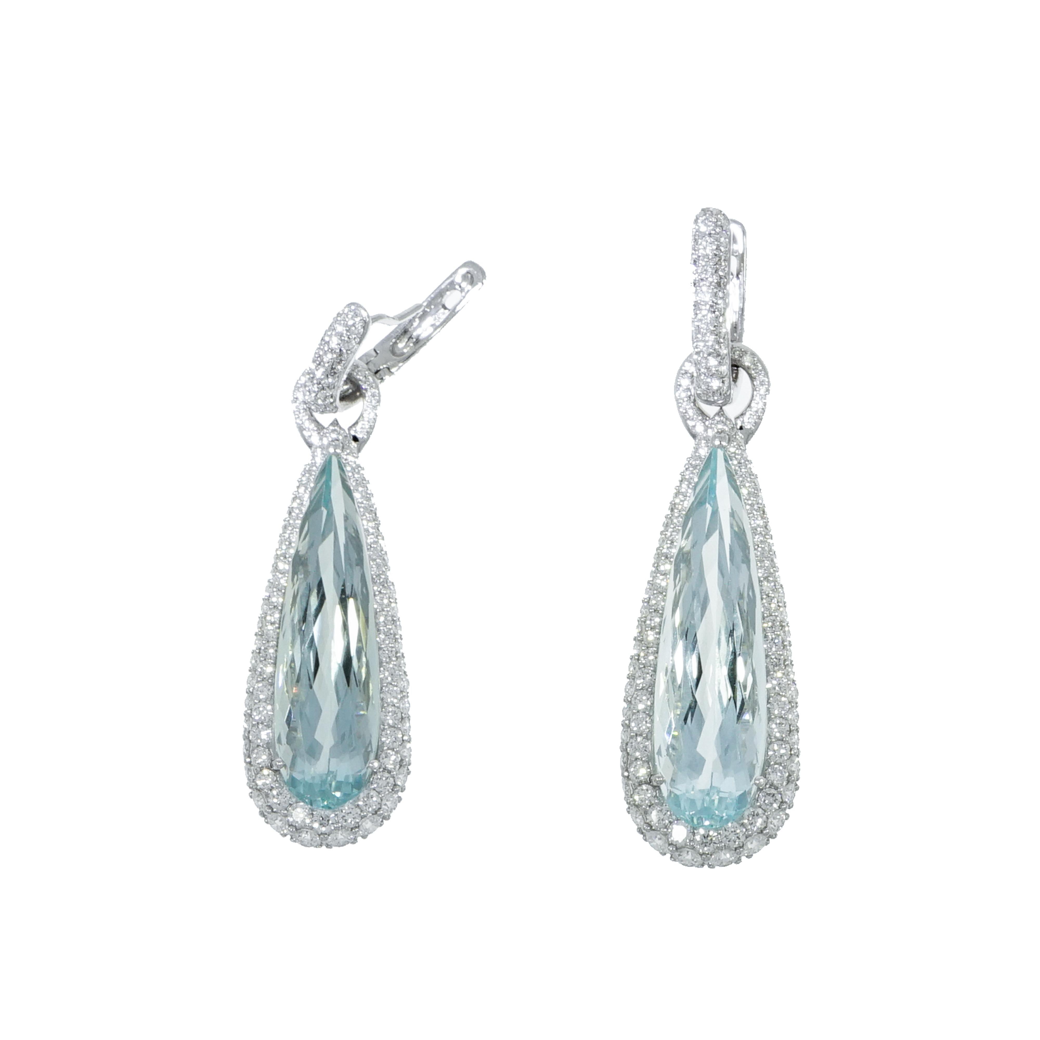Classic, elegant, refined and sparkly... Designed with an intuitive feel for women who's seeking for wearable piece of art.
This Aquamarine and Diamond Drop earrings appeals to the one of discerning taste and style who demand only the finest quality