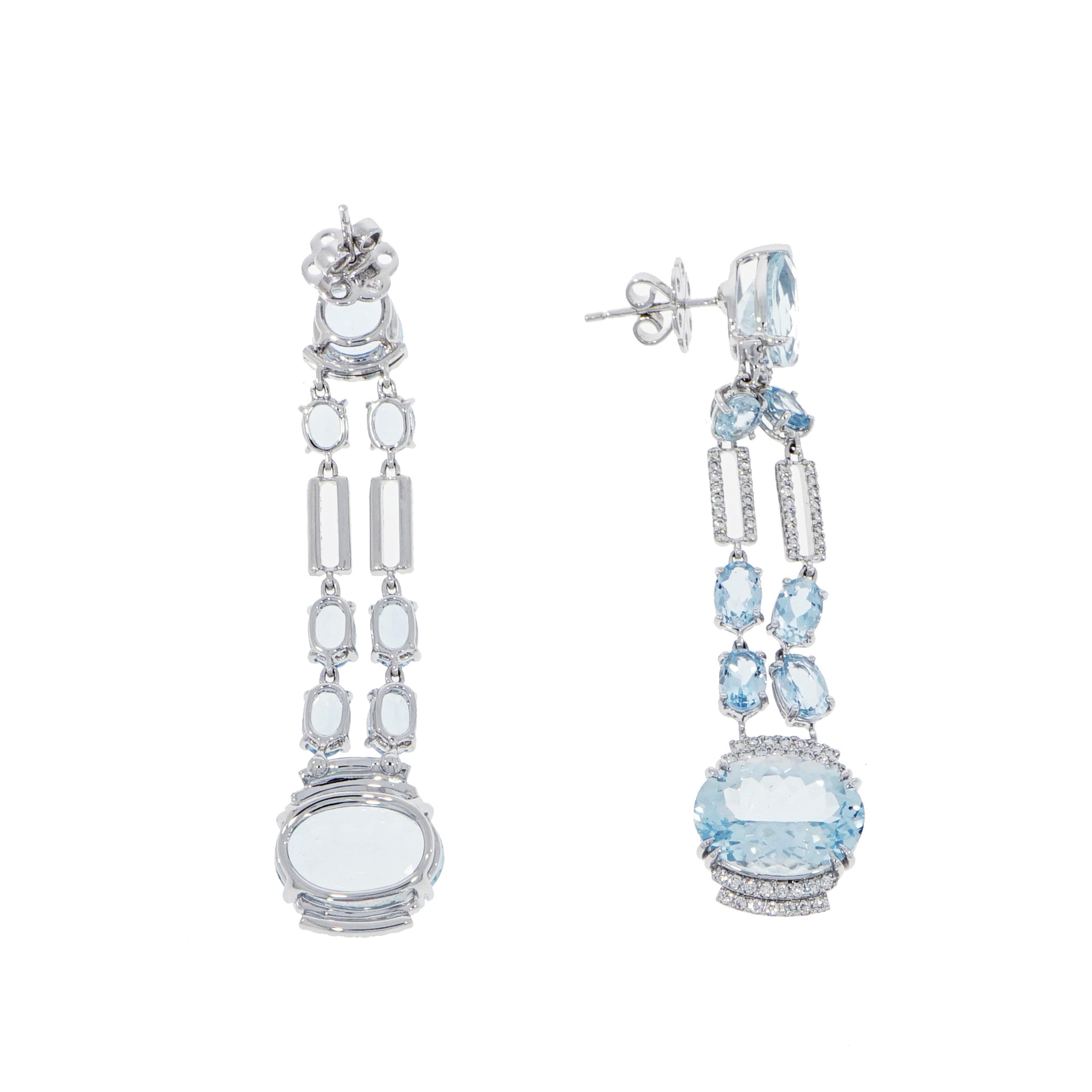 Waterside glam is incomplete without a few elements of sparkle. These Aquamarine and 
Diamond earrings are perfect for bringing color and structure to the shoulder and is a great summer accessory.
Designed and crafted in Italy with 19.32 carats