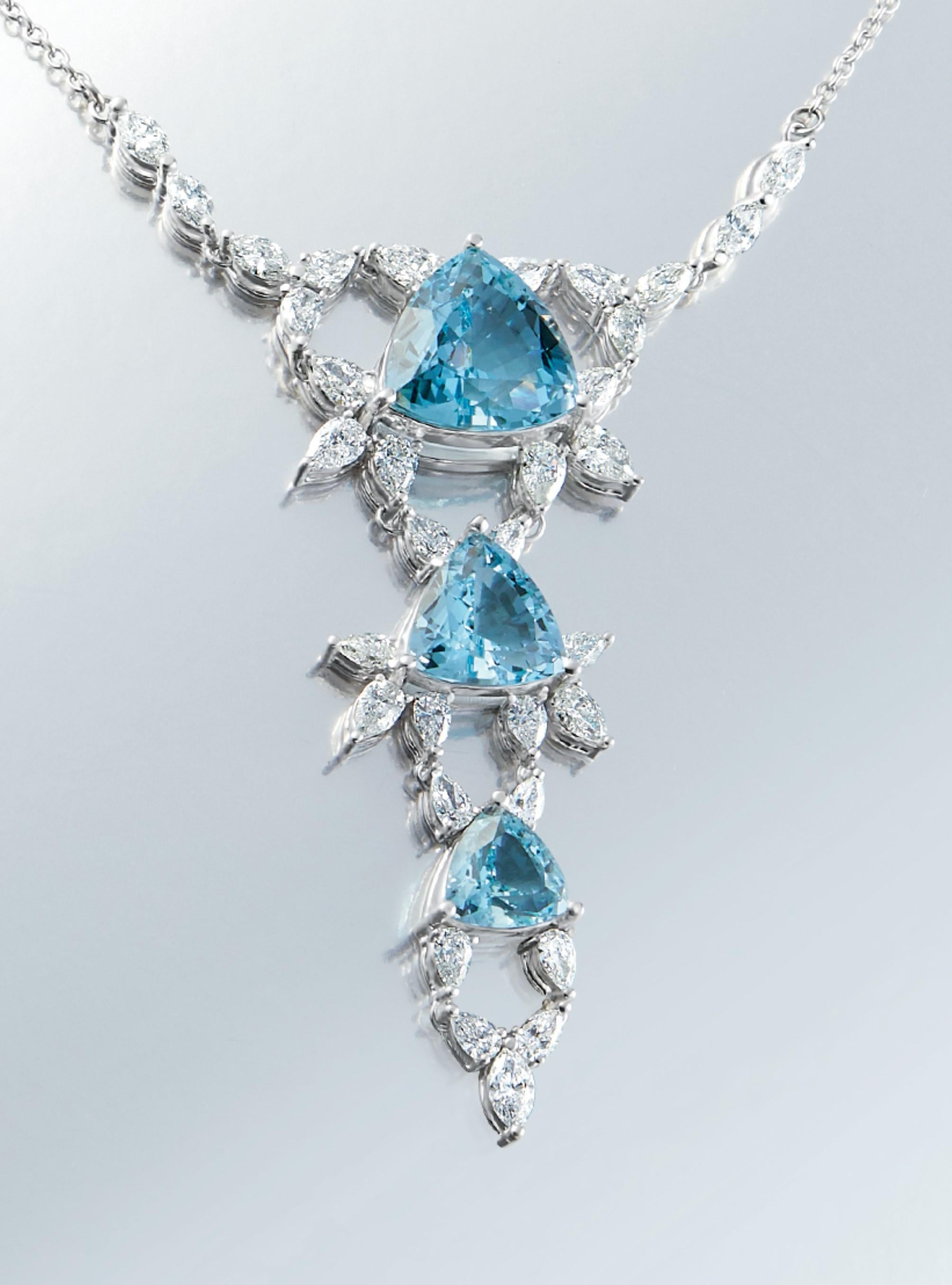 Beautiful set of aquamarine and diamond Necklace and earrings set in 18K white gold.  Includes almost 19 carats of fine aquamarines and 6.61 total carat wait of white diamonds. 
Necklace: 13.77tcw aquamarine, 3.70tcw diamond
Earrings: 5.21tcw