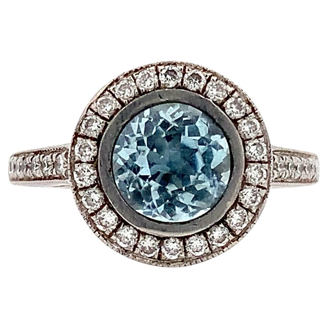 Aquamarine and diamond halo art deco engagement ring 18k white gold
