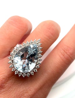 Aquamarine and diamond halo cluster art deco cocktail ring 18k white gold