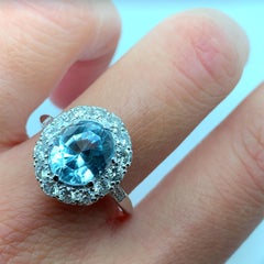 Aquamarine and diamond halo cluster art deco cocktail ring platinum
