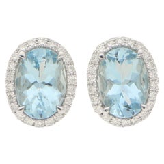 Aquamarine and Diamond Halo Cluster Earrings Set in 18 Karat White Gold