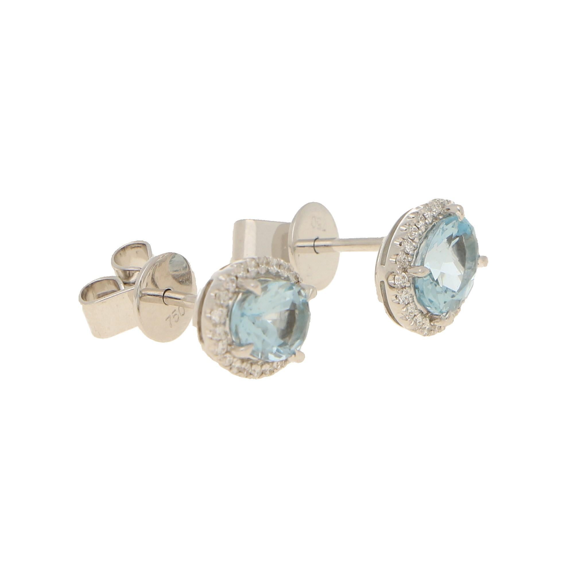 Modern Aquamarine and Diamond Halo Cluster Earrings Set in 18 Karat White Gold
