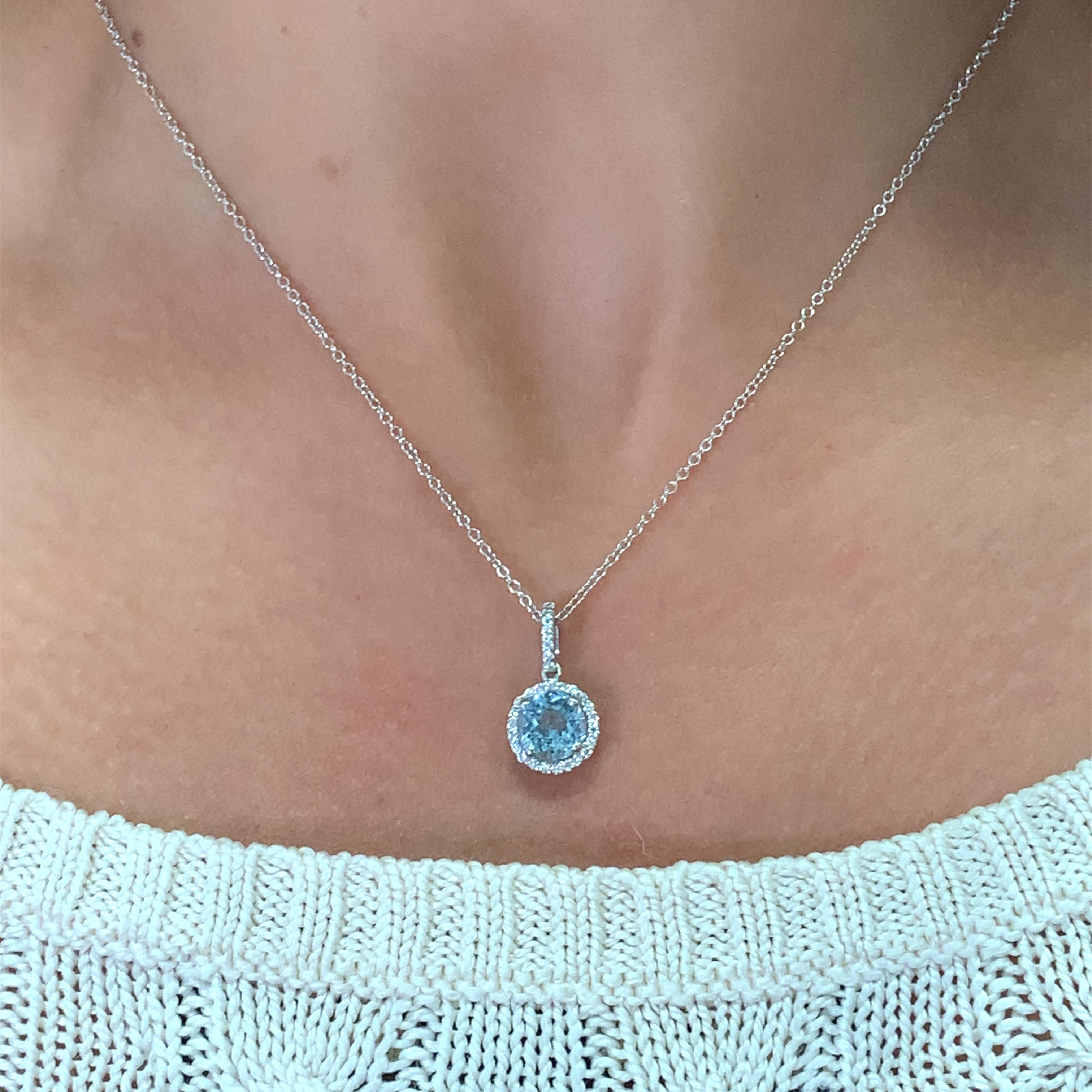 Enhance your jewellery collection with this exquisite 1.80ct Aquamarine and Diamond solitaire pendant necklace. Crafted from 18ct white gold, this pendant features a round Aquamarine gemstone in a solitaire setting, accompanied by a single diamond.