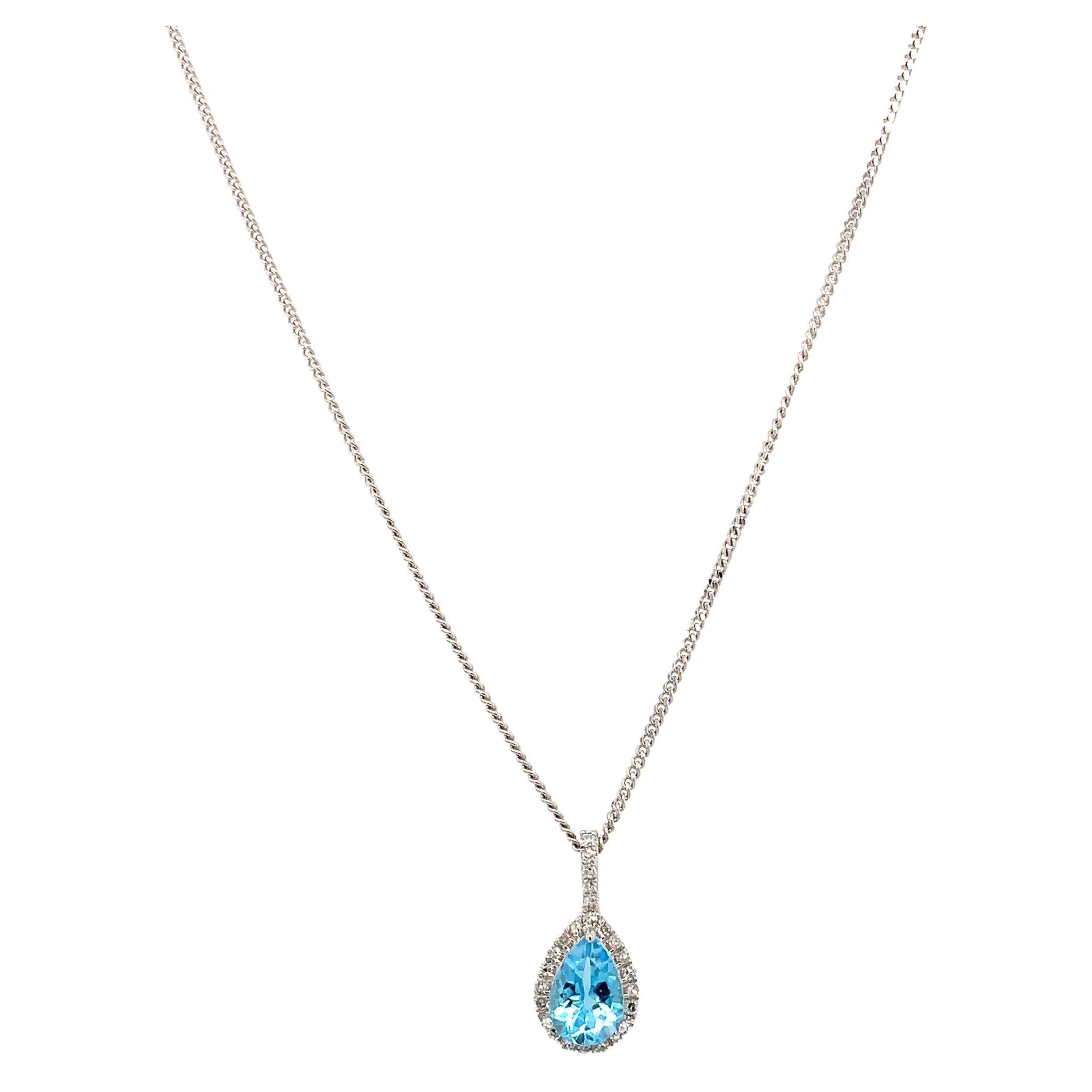 Collar con colgante gota en forma de pera de aguamarina y halo de diamantes oro blanco