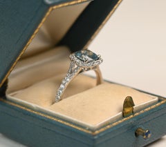 Aquamarine and Diamond Halo Ring. 1ct Cushion Cut Aquamarine 18K White Gold