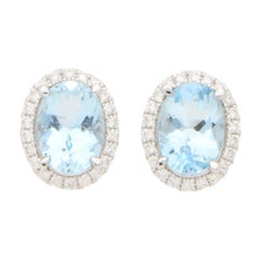 Aquamarine and Diamond Halo Stud Earrings Set in 18k White Gold