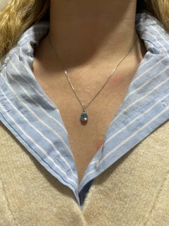 Aquamarine and Diamond Oval Cluster Pendant 18 Karat White Gold