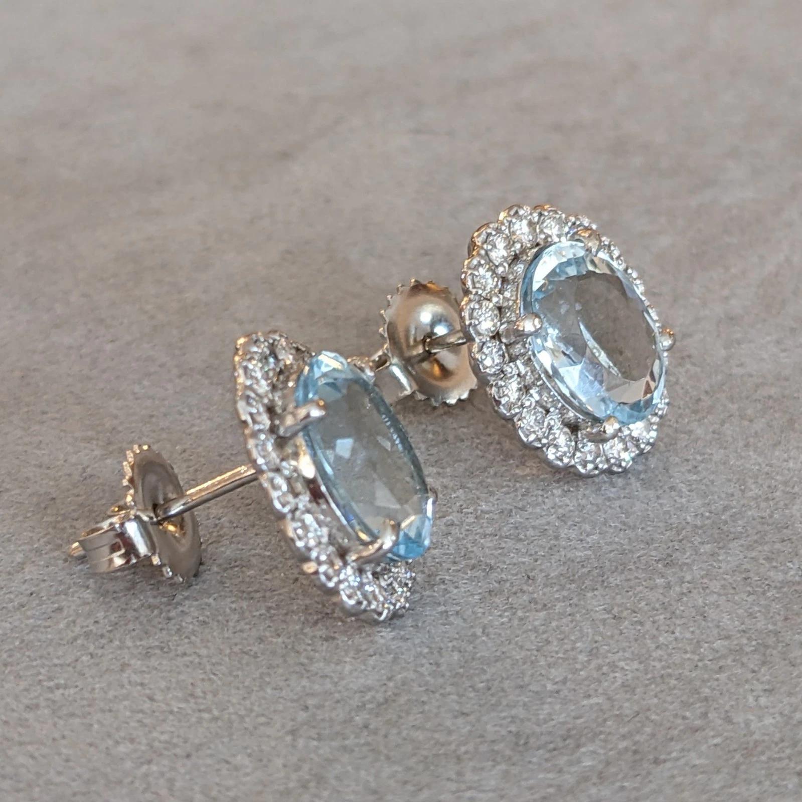 Oval Cut Aquamarine and Diamond Oval Halo Earrings in 18k White Gold For Sale