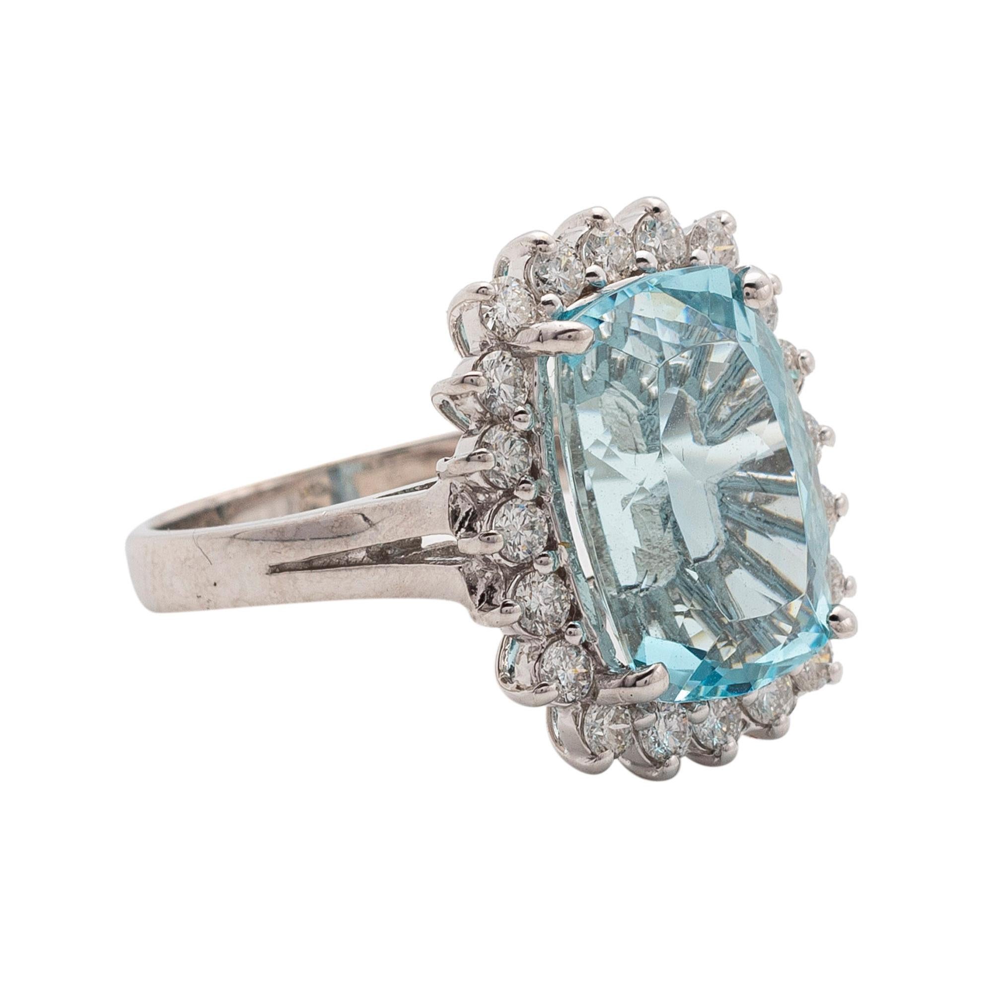 Aquamarine and Diamond Ring
Claw-set with a rectangular step-cut aquamarine weighing approximately 5.76 carats, within a surround of brilliant-cut diamonds weighing approximately .65 carats
set in 14 karat white gold,
size 6. 