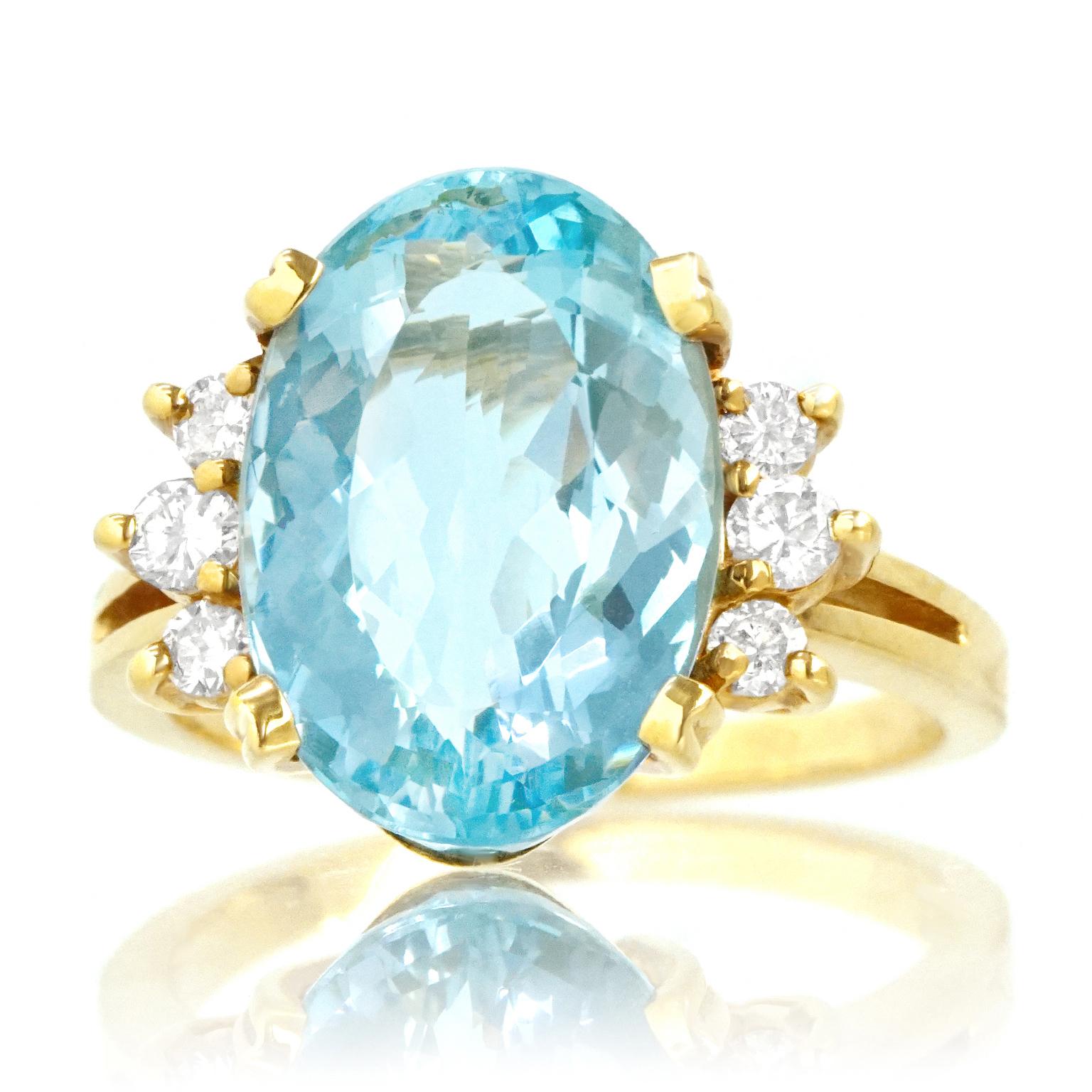 Oval Cut Aquamarine and Diamond Set Gold Ring