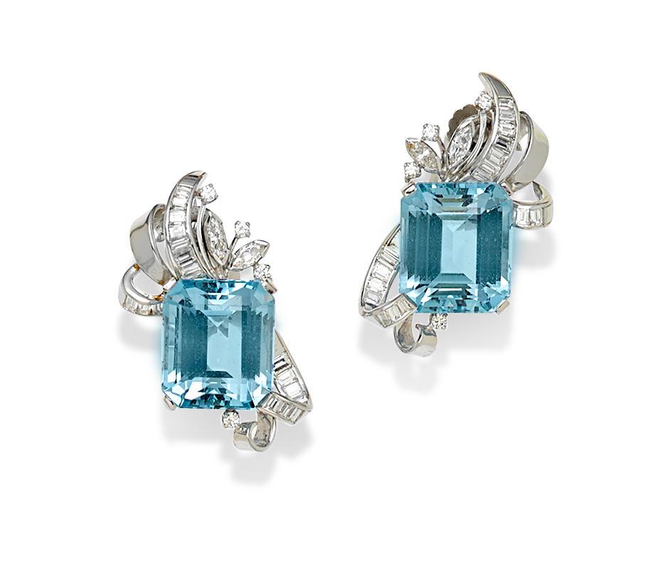 Gorgeous Platinum Earrings
Features a pair of Step-cut Aquamarine Stones appx. Dimensions 14.85 x 13.45 x 10.4 mm. 
Second Stone is 14.95 x 13.22 x 9.85 mm.
Earring Length = 1.25