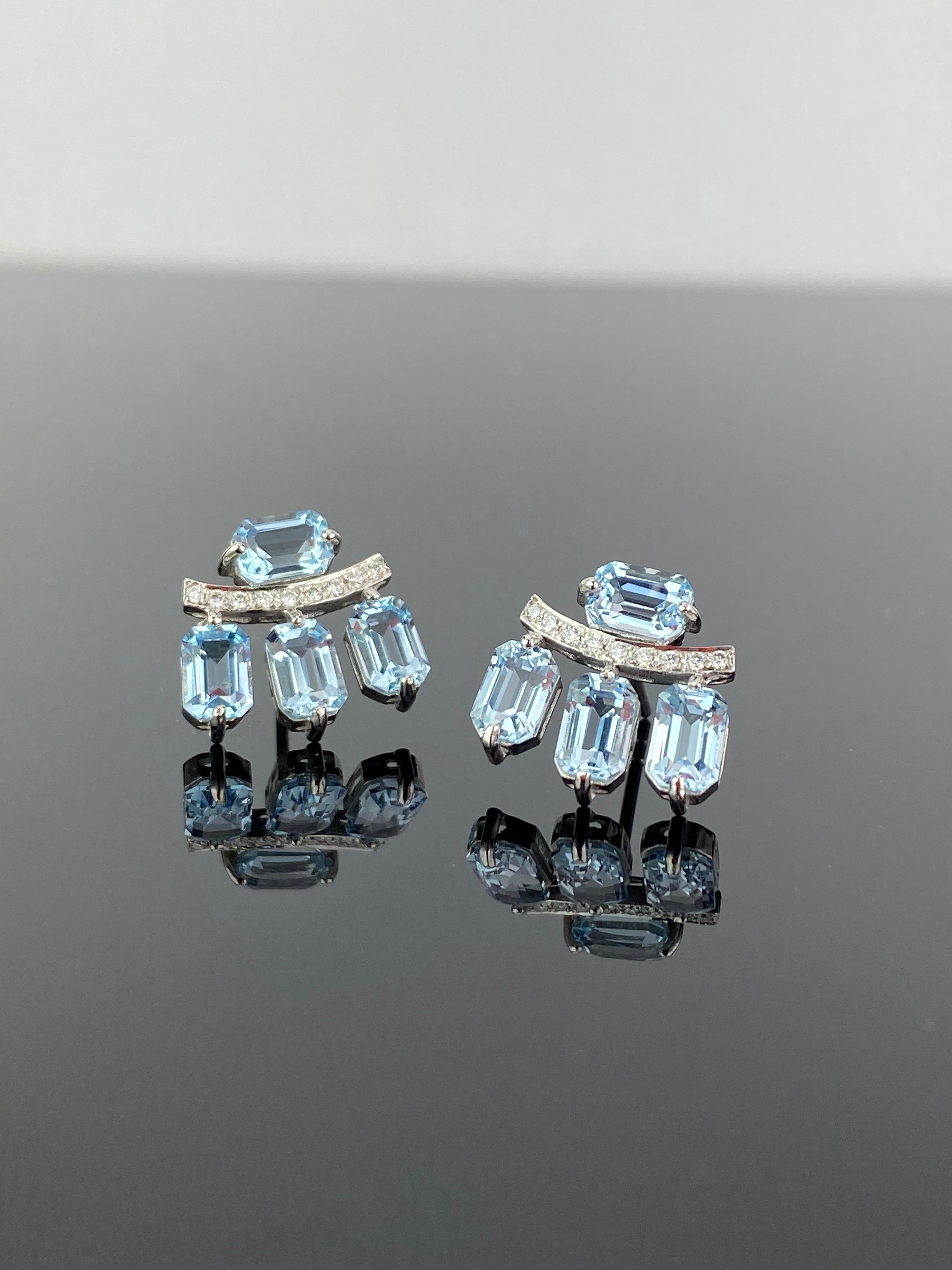 A pair of unique 5.83 carat Aquamarine and Diamond studs, set in solid 18K White Gold. The emerald cut Aquamarines are of top quality, absolutely transparent and great luster. 
Message us for more information!