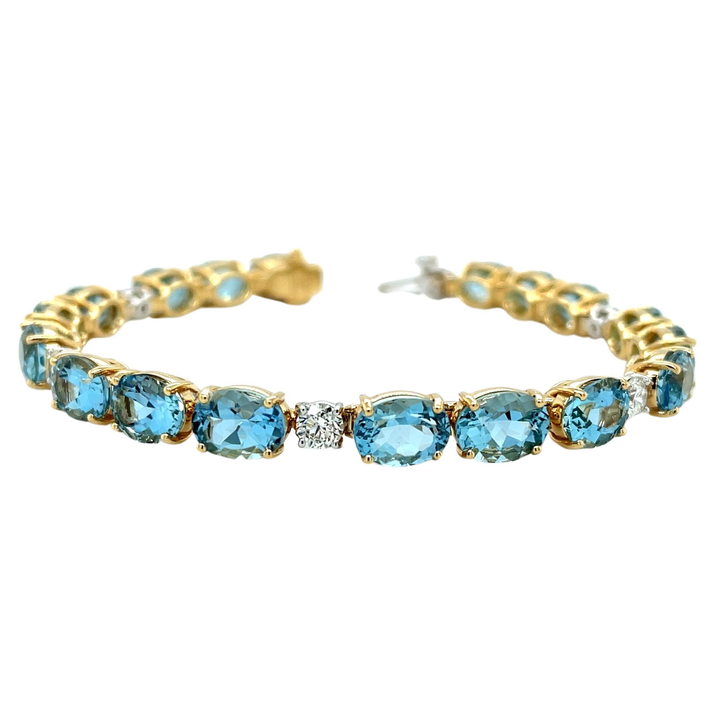 Bracelet tennis en or 18 carats avec aigue-marine et diamants, 20,99 carats au total en vente