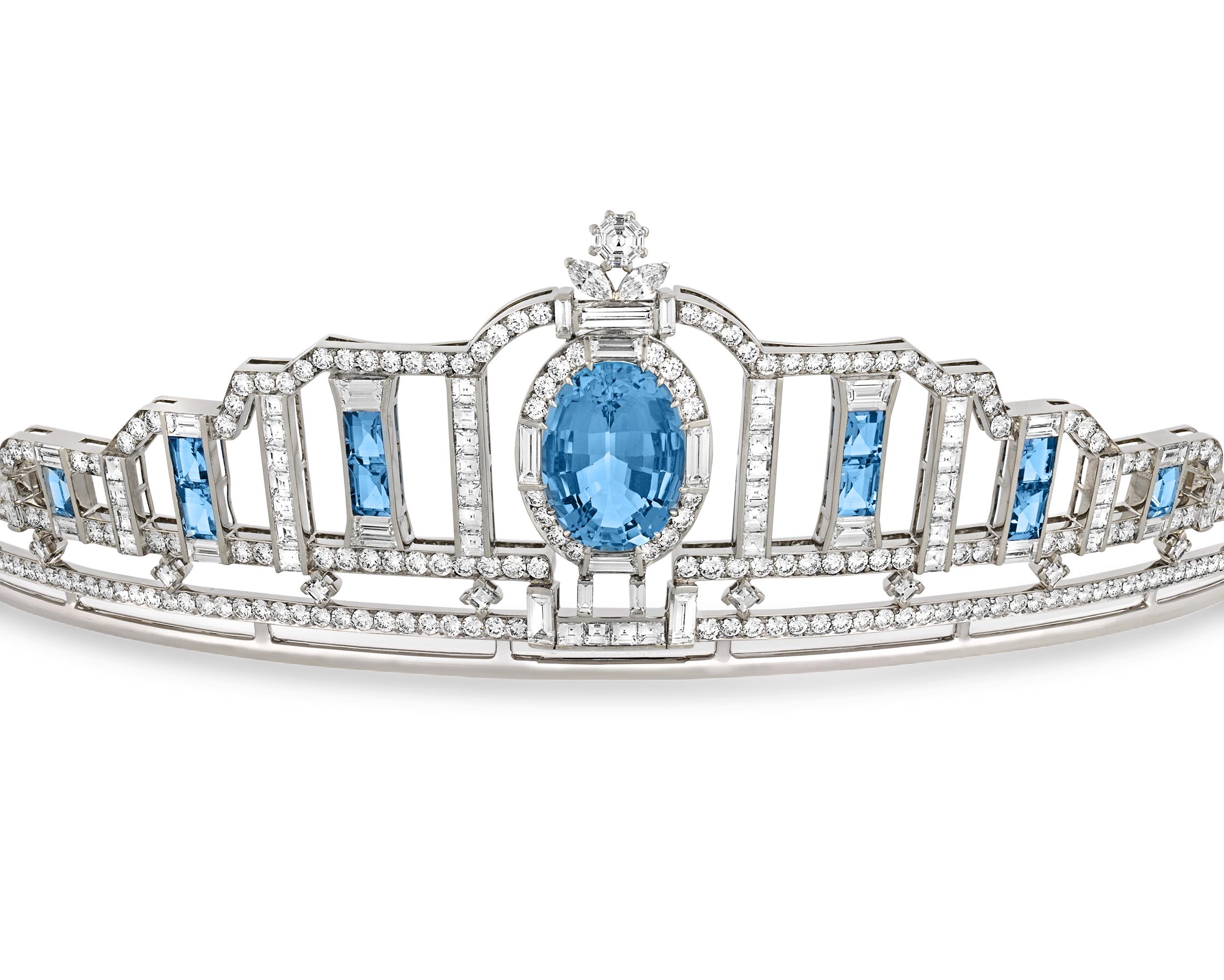 With the stunning blue hue of a clear tropical ocean, the incredible aquamarines in this tiara are absolutely captivating. The brilliant stones total 15.00 carats and are all set in a masterful Art Deco-inspired platinum and 18K white gold design by