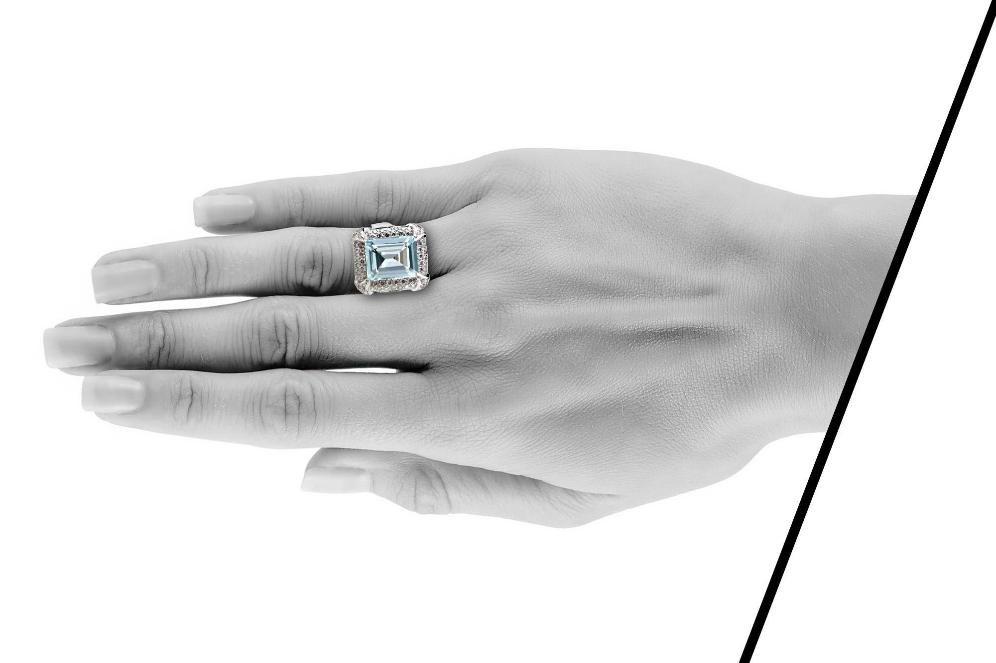 Ring finely crafted in 18K white gold.
The aqua weighs an approximate total of 10.00 ct.
The diamonds weigh approximately 14.10 ct.