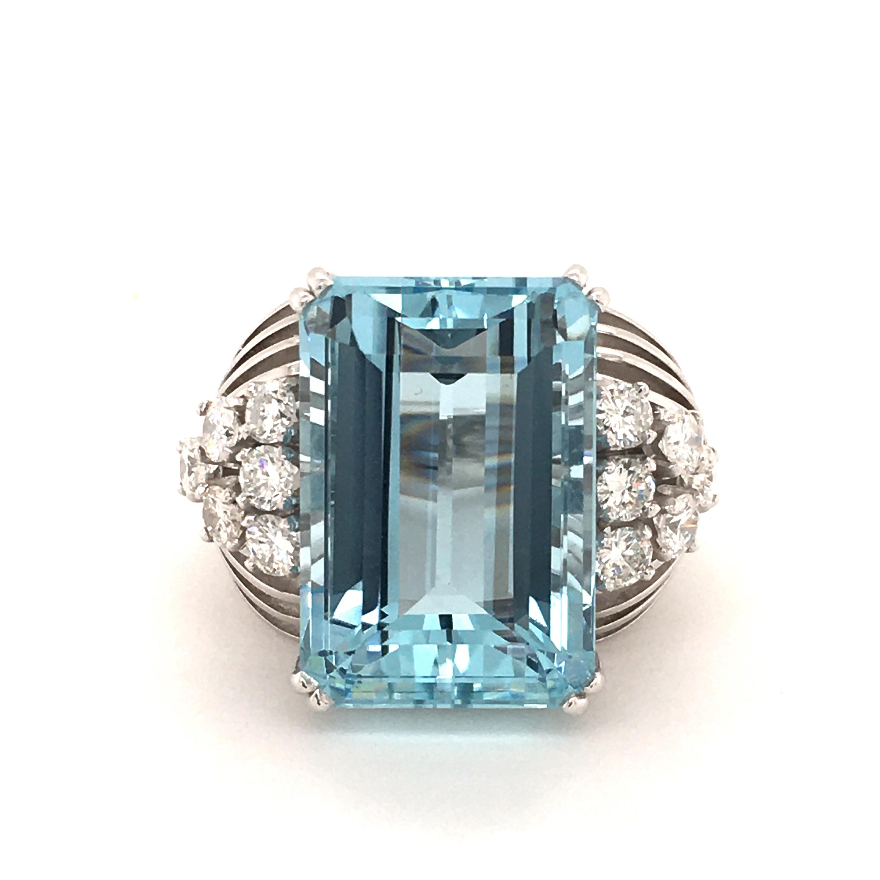 A clean aquamarine of approx. stunning 18 carats and 12 brilliant cut diamonds totaling approx. 1.20 ct of G/H-vs quality are mounted in this 14K white gold ring.

Please, ask for additional pictures if you are interested in this item.

Size: 55.5 /