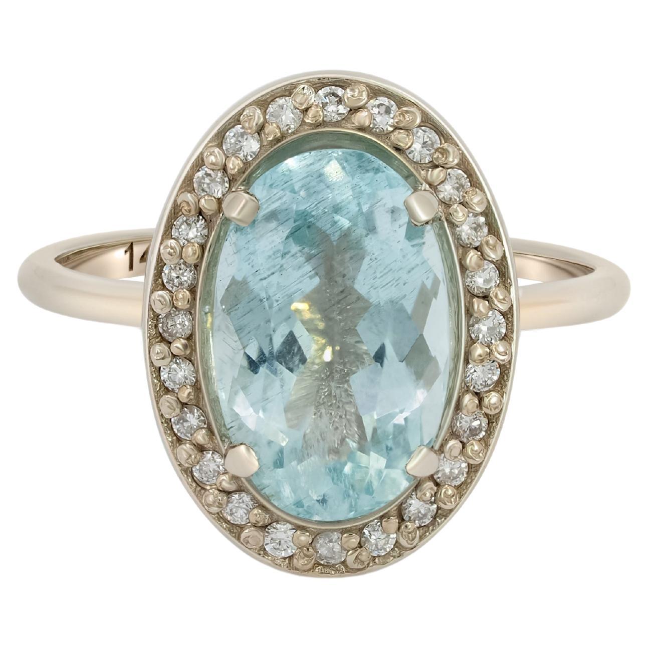 Aquamarine and diamonds 14k gold ring