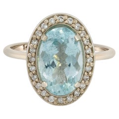Aquamarine and diamonds 14k gold ring