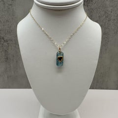 Aquamarine and Garnet Pendant Necklace in Yellow Gold