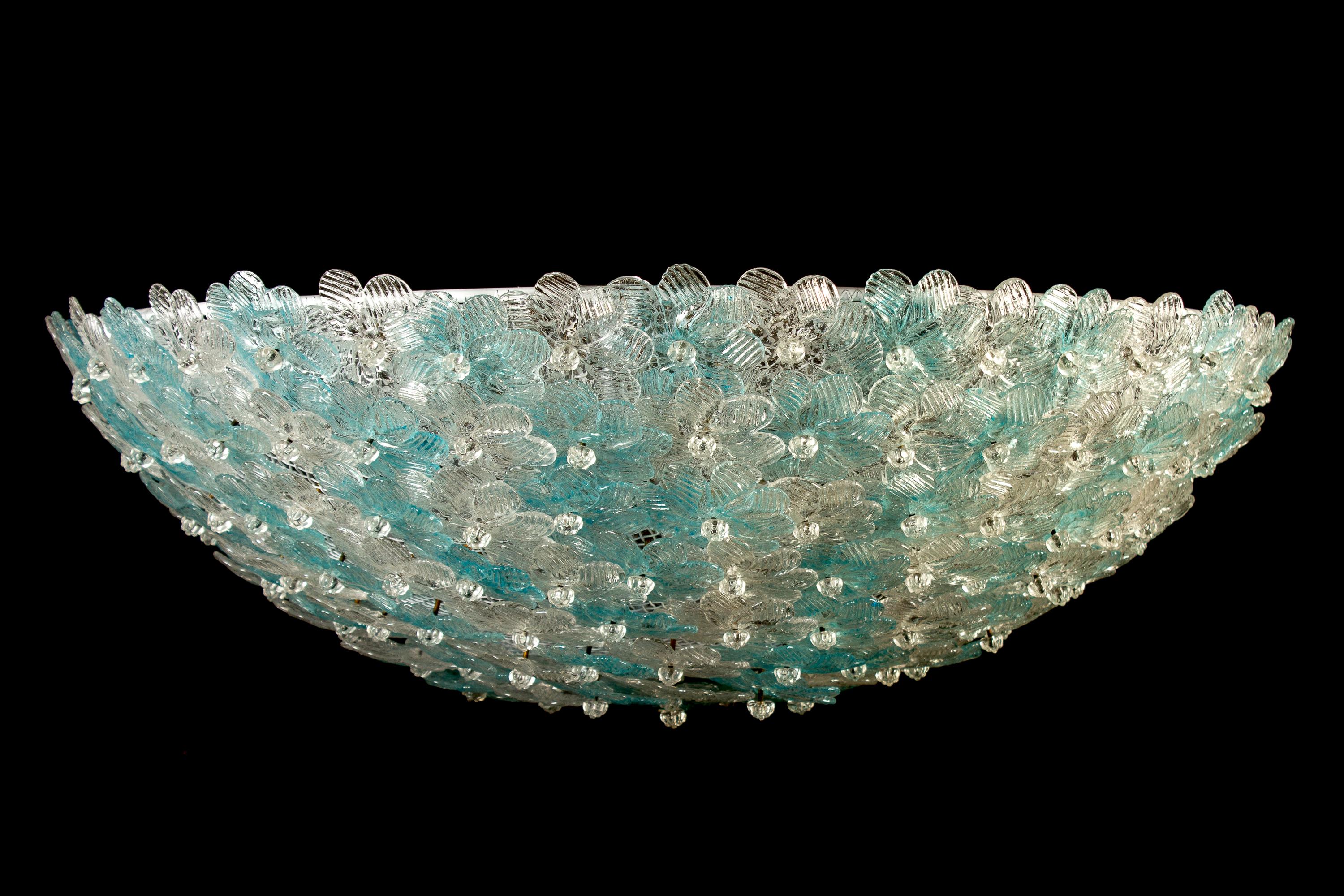 Amazing Mid-Century Modern hand blown Italian flush mount chandelier featuring overlapping crystal flowers, Aquamarine and ice, mounted on a webbed white painted frame.
3 x E27 \ 4 watt light bulbs.