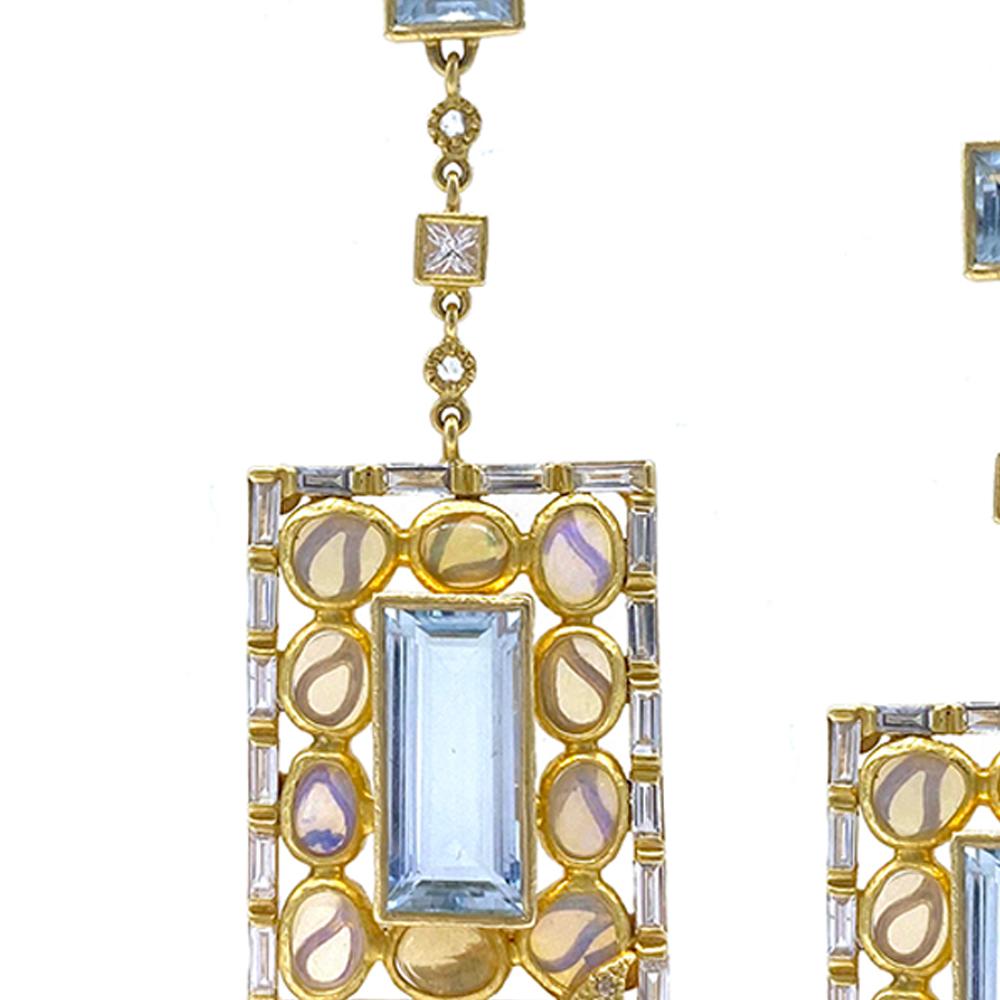 Affinity Earrings Set in 20 Karat Yellow Gold with 15.56 Carat Aquamarine, 4.56 Carat Opals, and 2.99 Carat Diamonds. These Are Dangle Earrings with Emerald Cut Aquamarine and Rose-Cut Opal Surroundings.