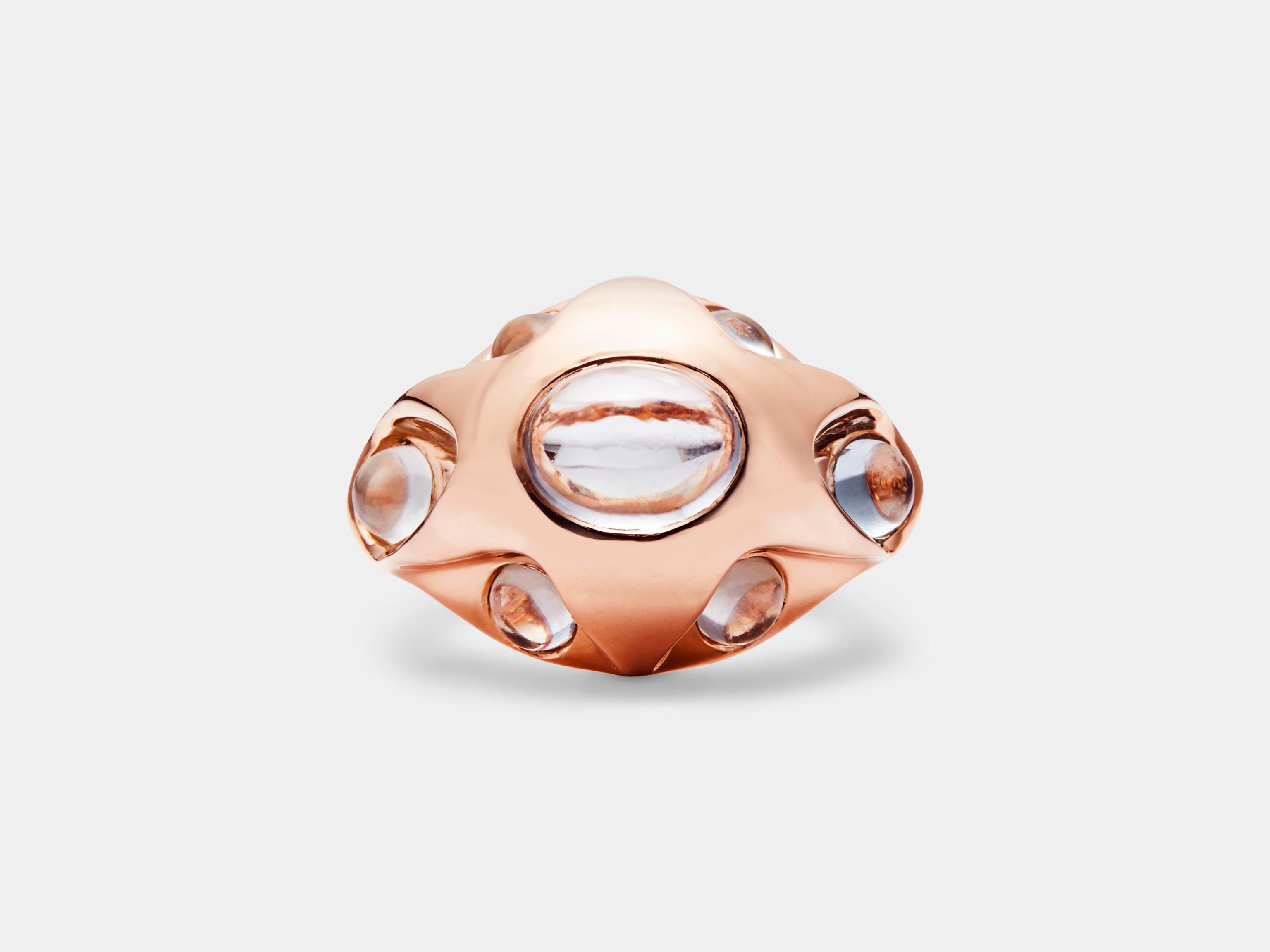Sagan Bombé Ring with Aquamarine from modern fine jewelry house, Baker & Black. This cocktail ring, with its astral shape and retrofuturist vibes, draws its name from cosmologist and 80's icon, Carl Sagan. Featuring one of our favorite duos, rose