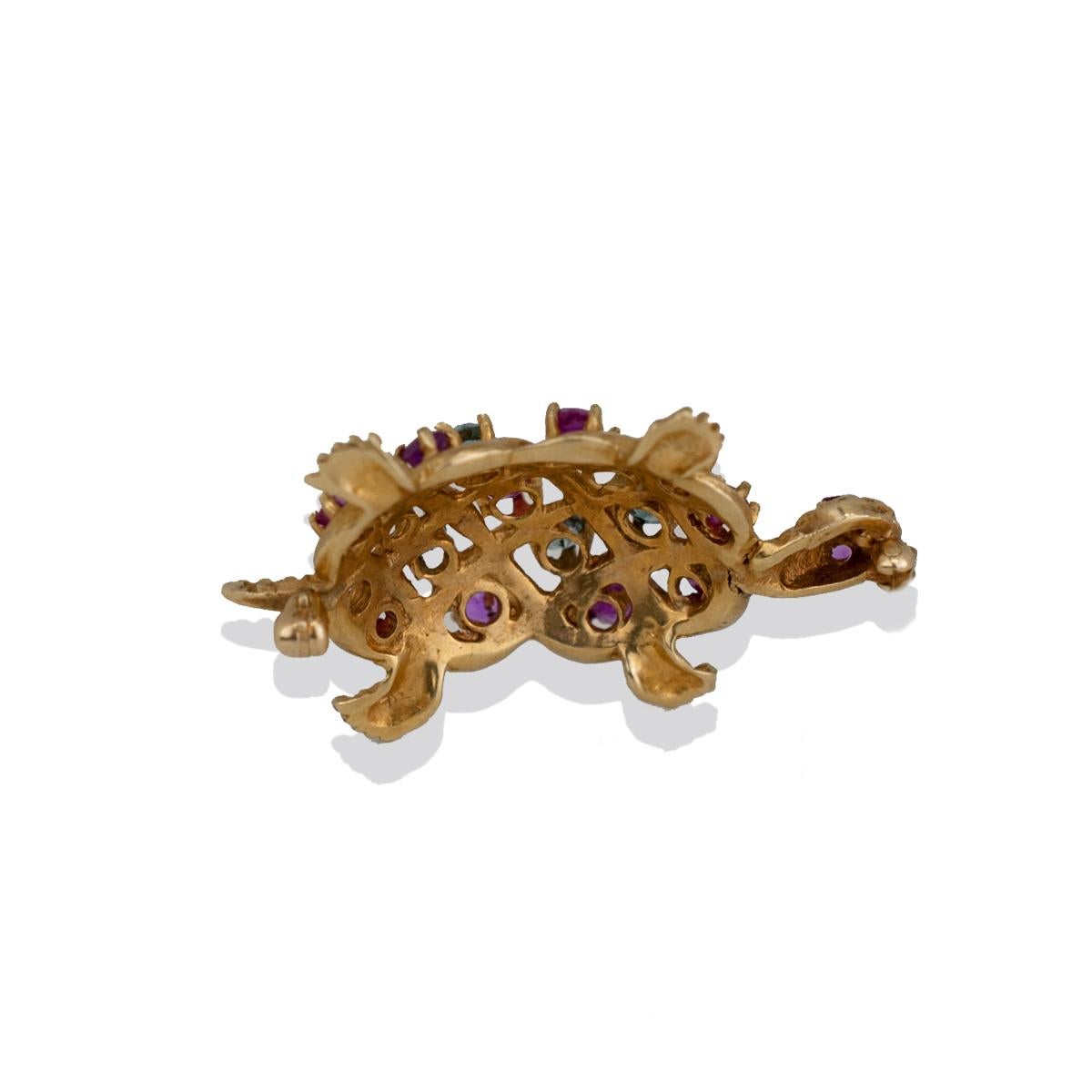 Aquamarine and Ruby, Turtle Pin, 1.60 TCW Gems, Yellow Gold
Measuring 1-3/4 x 1 inch this gemstone Turtle features 3 mm round rubies and aquamarine gemstones
Total weight of the (10) rubies are estimated at 1.00 carat
Total weight of the (6)