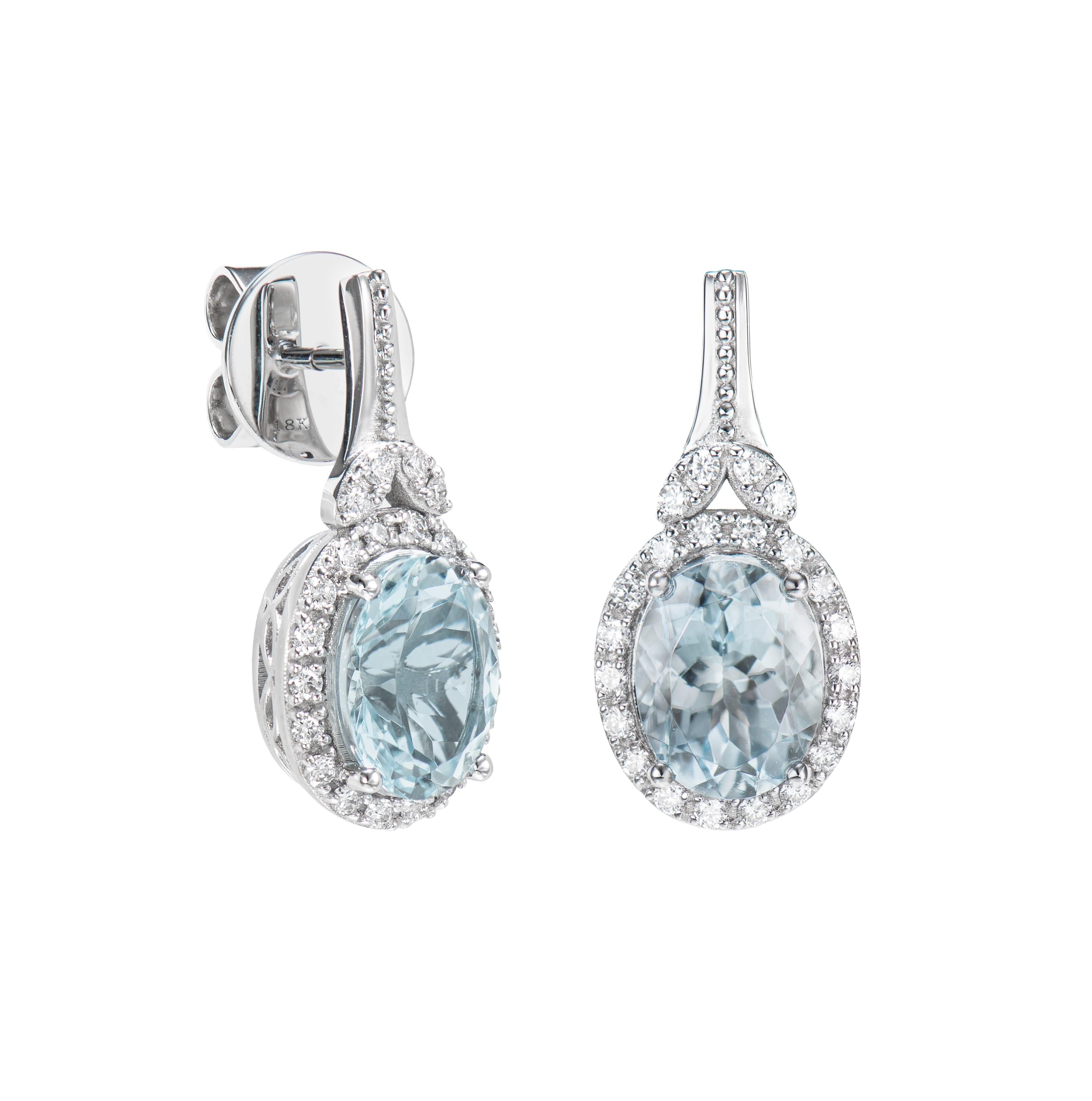 This collection features an array of aquamarines with an icy blue hue that is as cool as it gets! Accented with diamonds these Drops Earrings are made in white gold and present a classic yet elegant look. 

Aquamarine and White Diamond Drops Earring