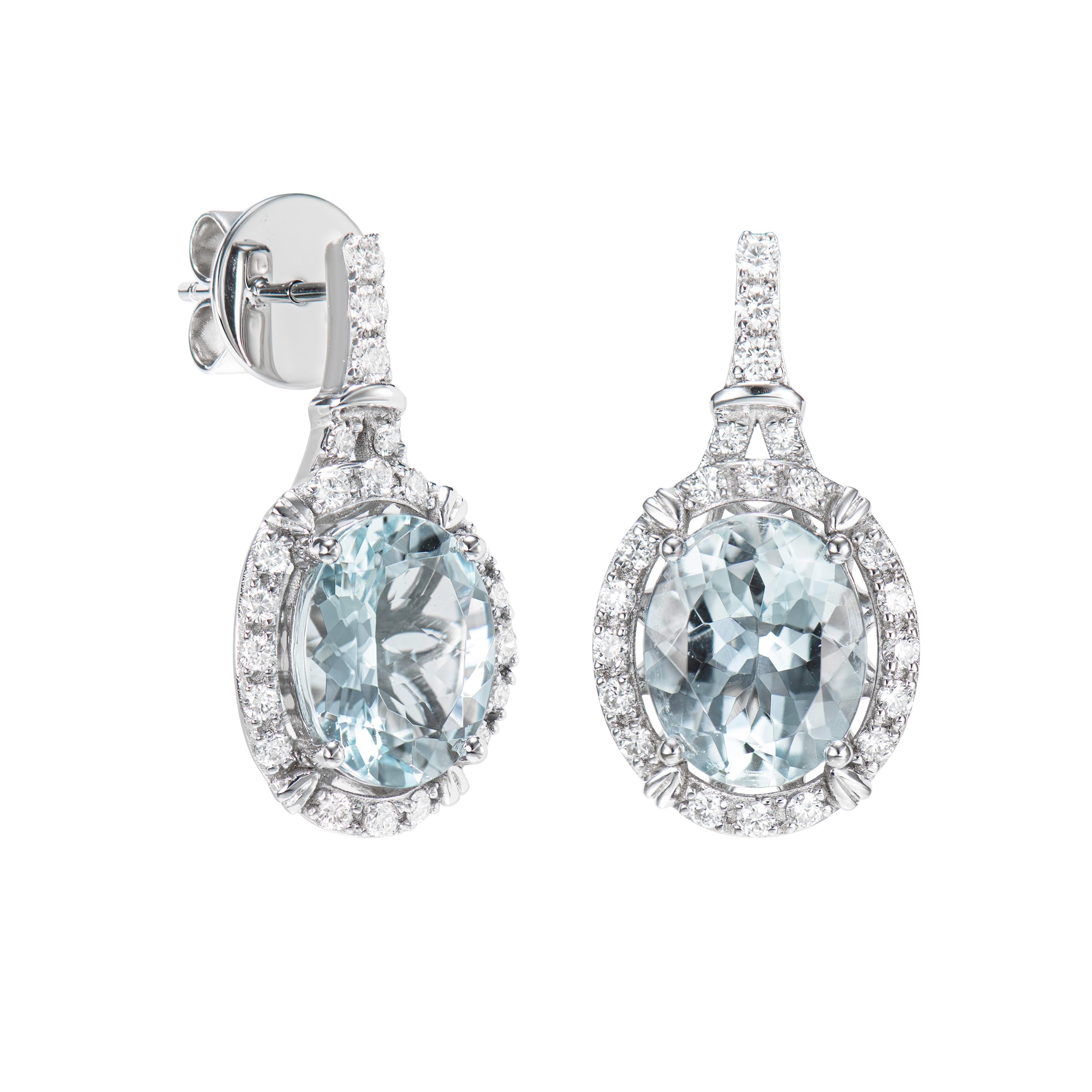 This collection features an array of aquamarines with an icy blue hue that is as cool as it gets! Accented with diamonds these Drops Earrings are made in white gold and present a classic yet elegant look. 

Aquamarine and White Diamond Drops Earring