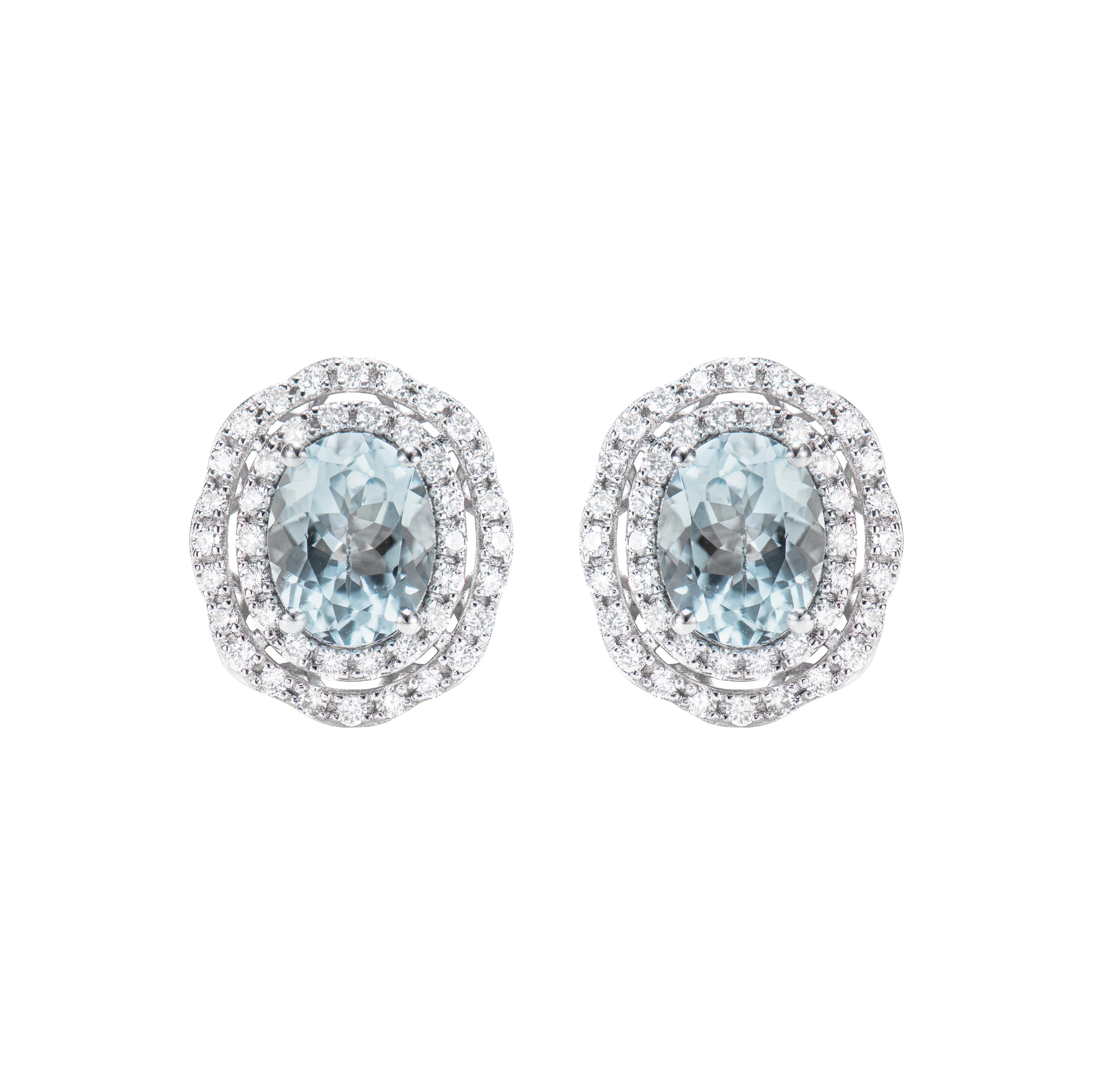 Contemporary Aquamarine and White Diamond Studs Earring in 18 Karat White Gold. For Sale