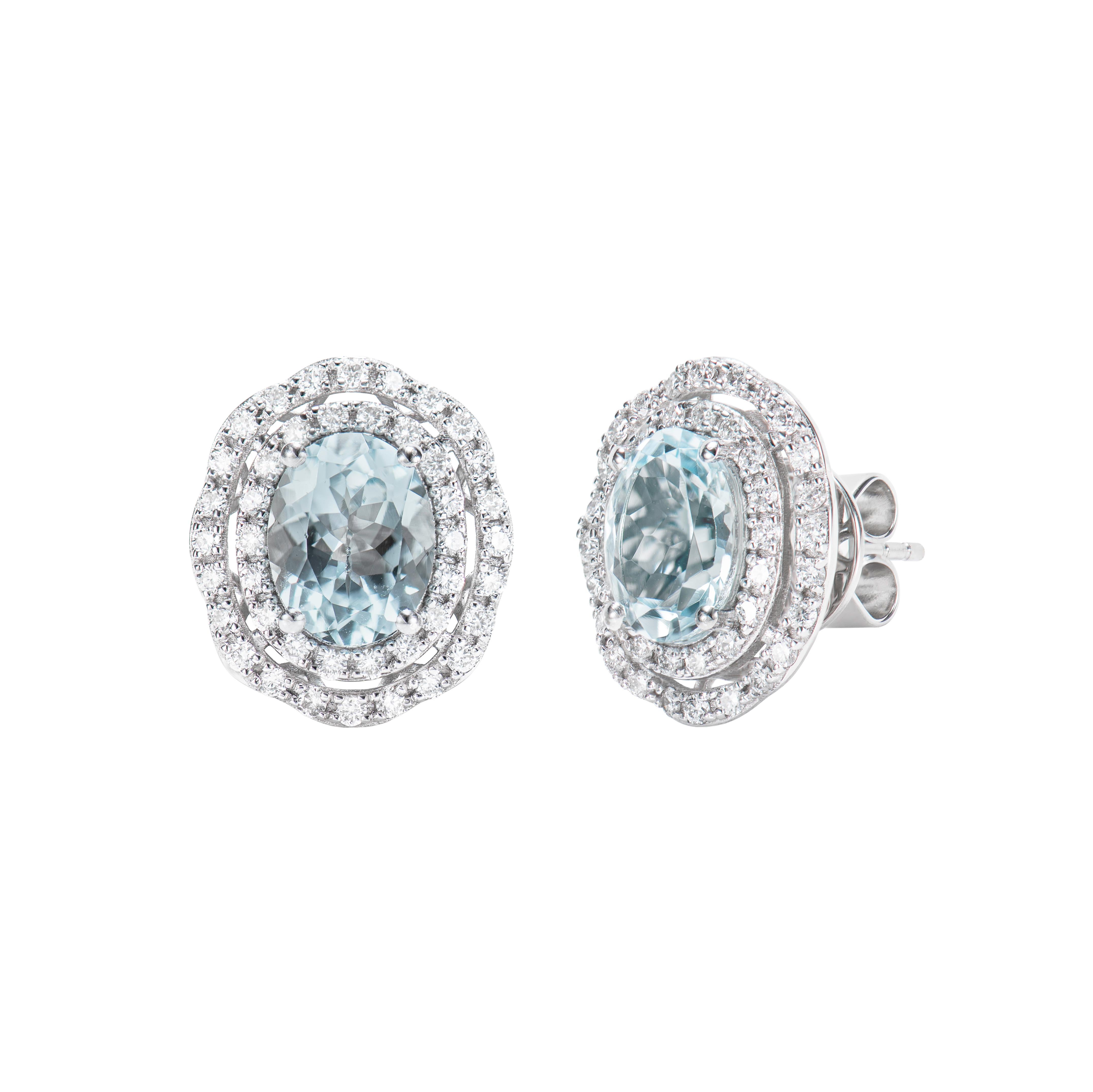 Oval Cut Aquamarine and White Diamond Studs Earring in 18 Karat White Gold. For Sale