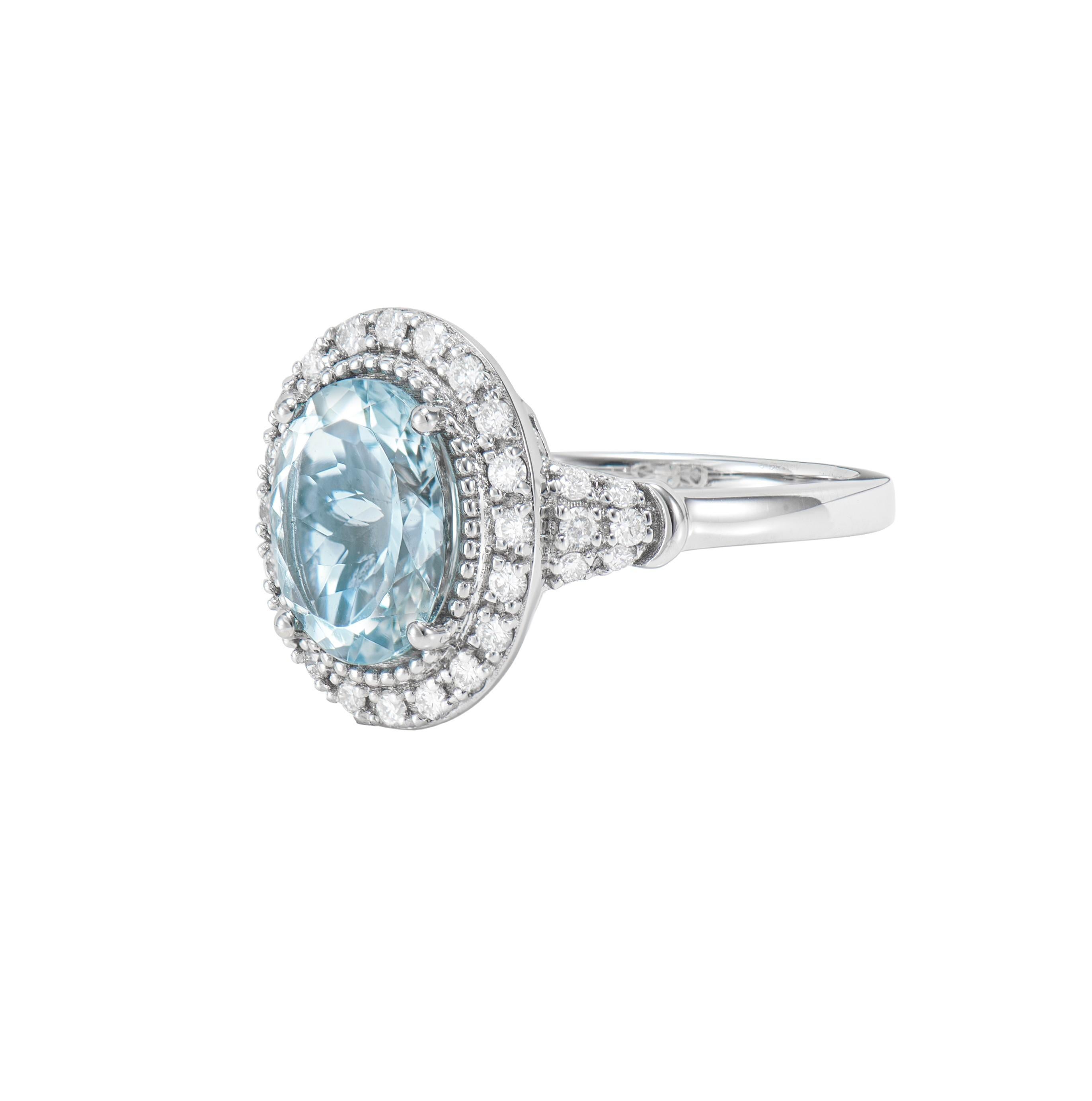 Oval Cut Aquamarine and White Diamond Ring in 18 Karat White Gold. For Sale