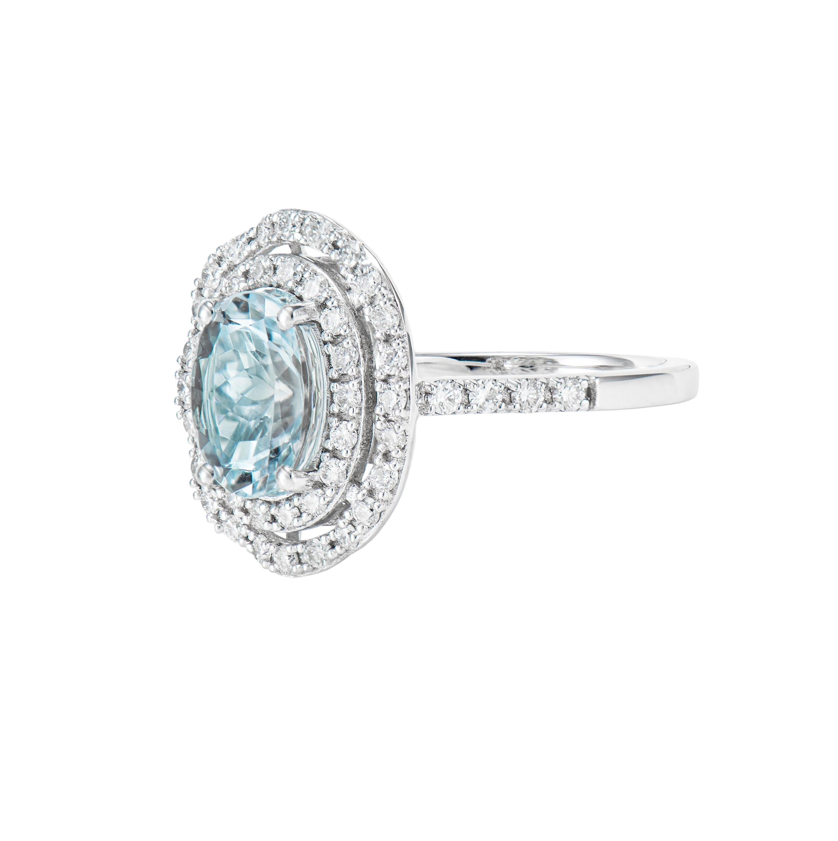 Oval Cut Aquamarine and White Diamond Ring in 18 Karat White Gold. For Sale