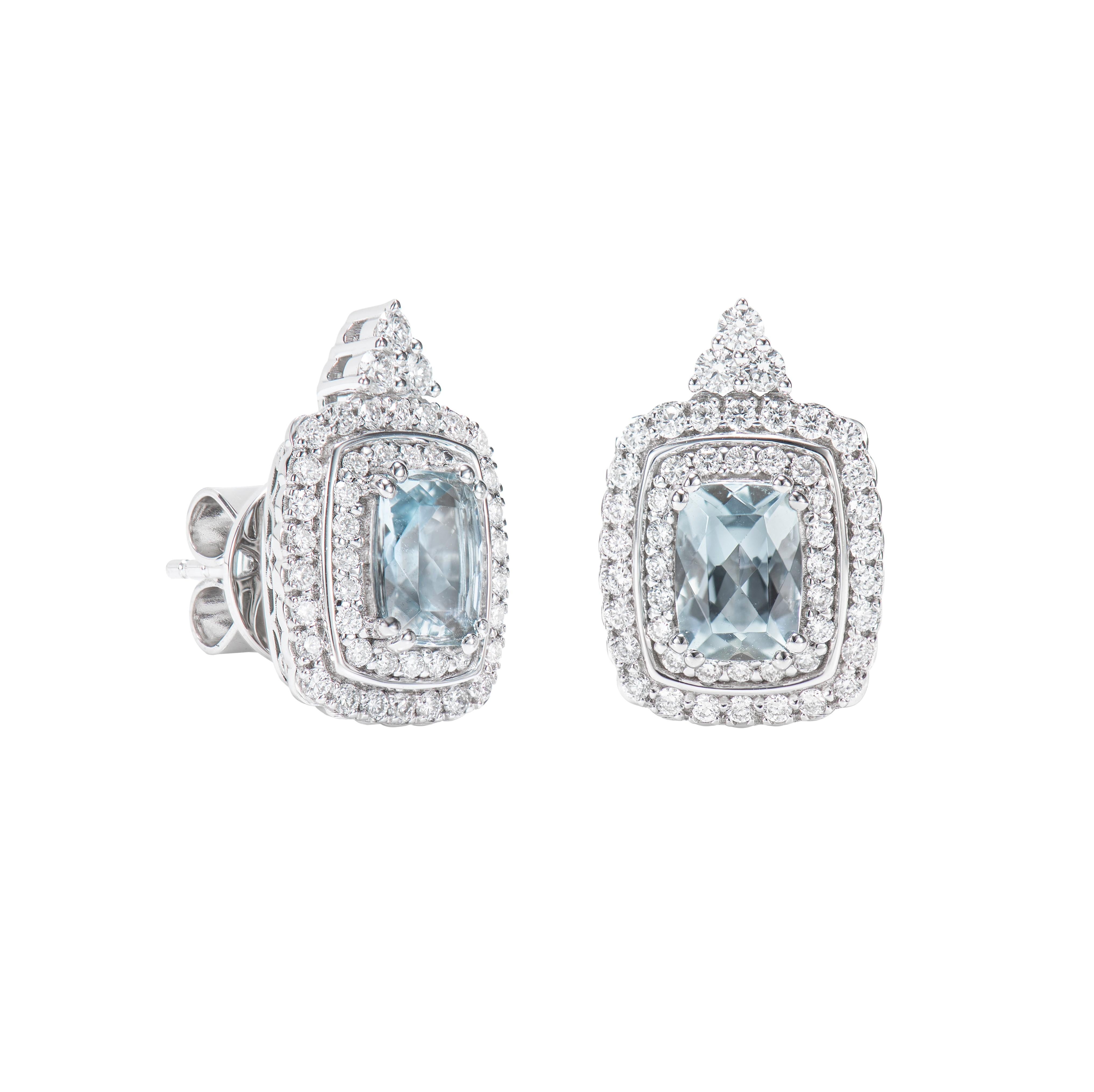 This collection features an array of aquamarines with an icy blue hue that is as cool as it gets! Accented with diamonds these Studs Earrings are made in white gold and present a classic yet elegant look. 

Aquamarine and White Diamond Studs Earring