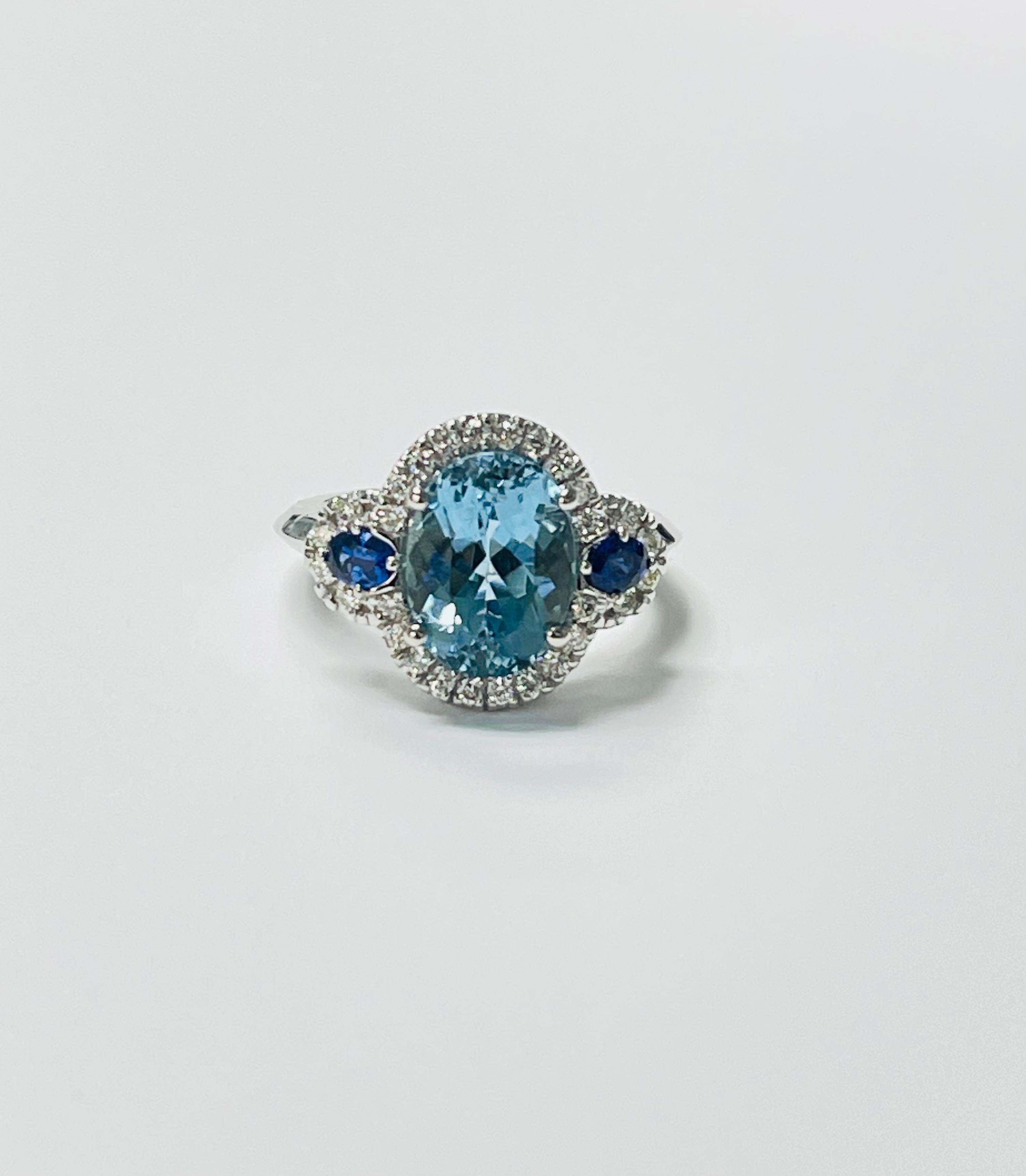 Oval Cut Aquamarine, Blue Sapphire and Diamond Engagement Ring In 14 Karat Gold. For Sale