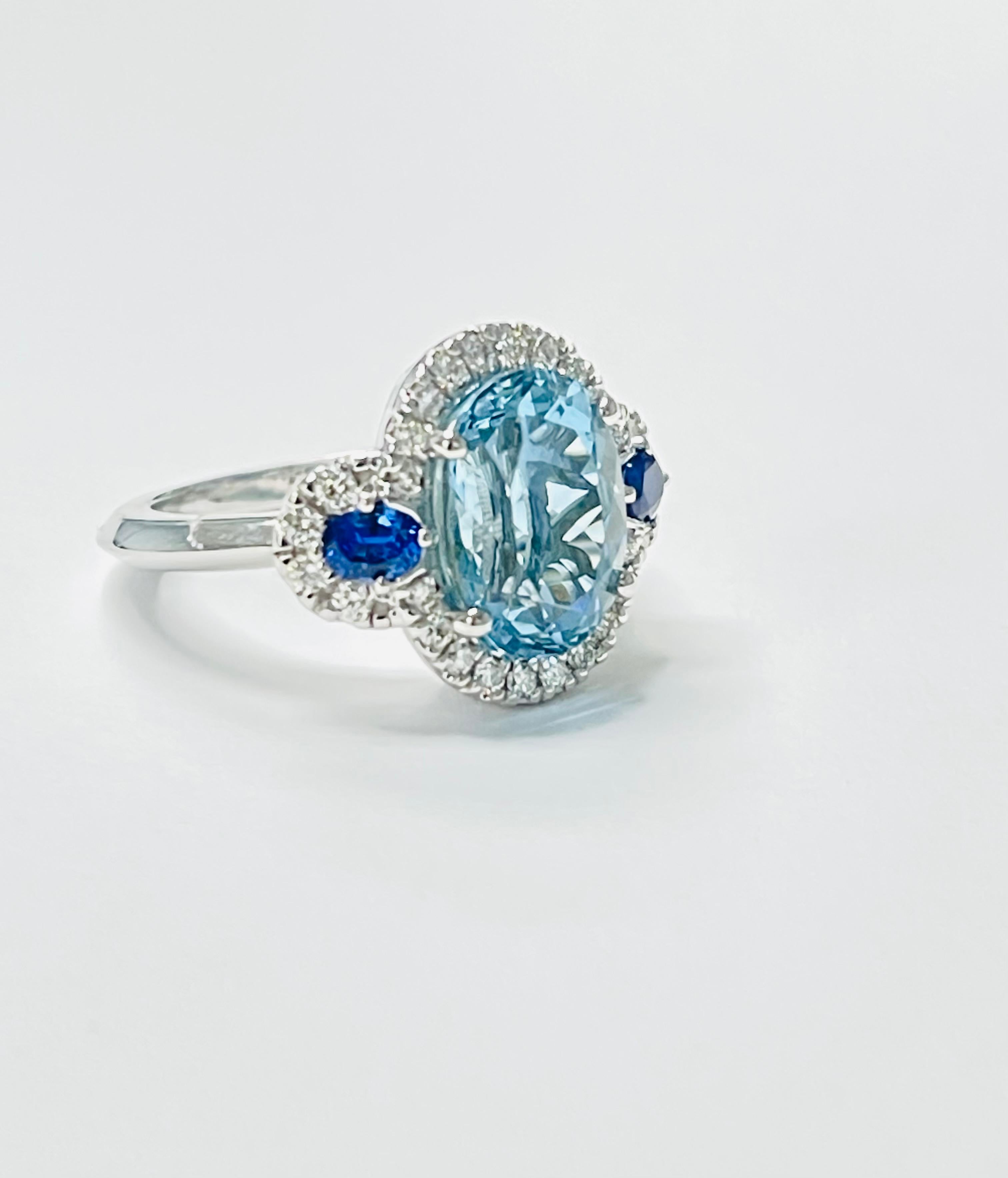 Aquamarine, Blue Sapphire and Diamond Engagement Ring In 14 Karat Gold. In New Condition For Sale In New York, NY